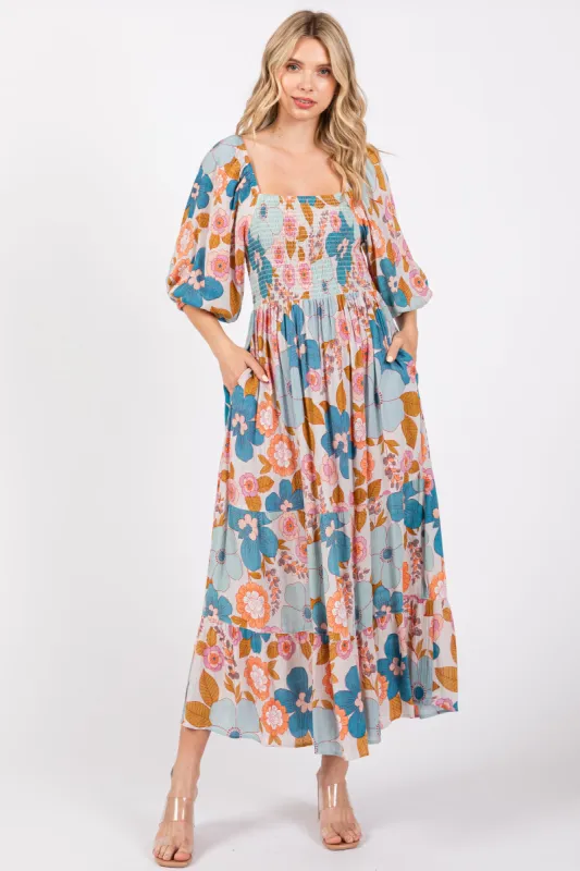Light Blue Floral Smocked Square Neck Tiered Midi Dress sold by Pinkblush