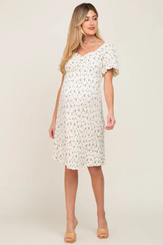 Ivory Smocked Floral Puff Sleeve Maternity Dress sold by Pinkblush