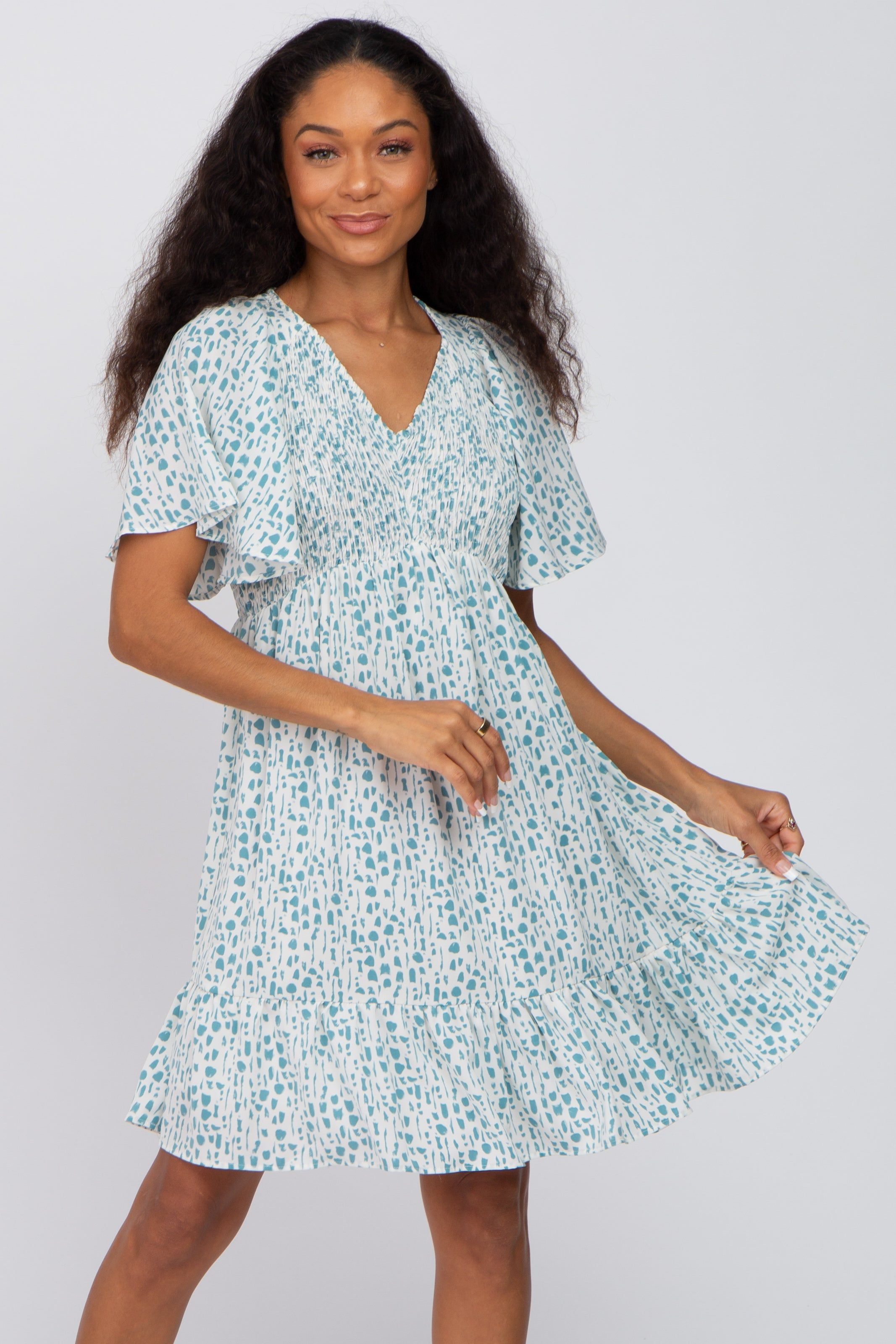 Teal Printed Smocked Dress sold by Pinkblush