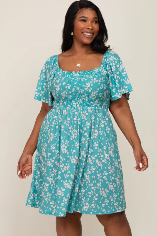Teal Floral Smocked Plus Dress sold by Pinkblush