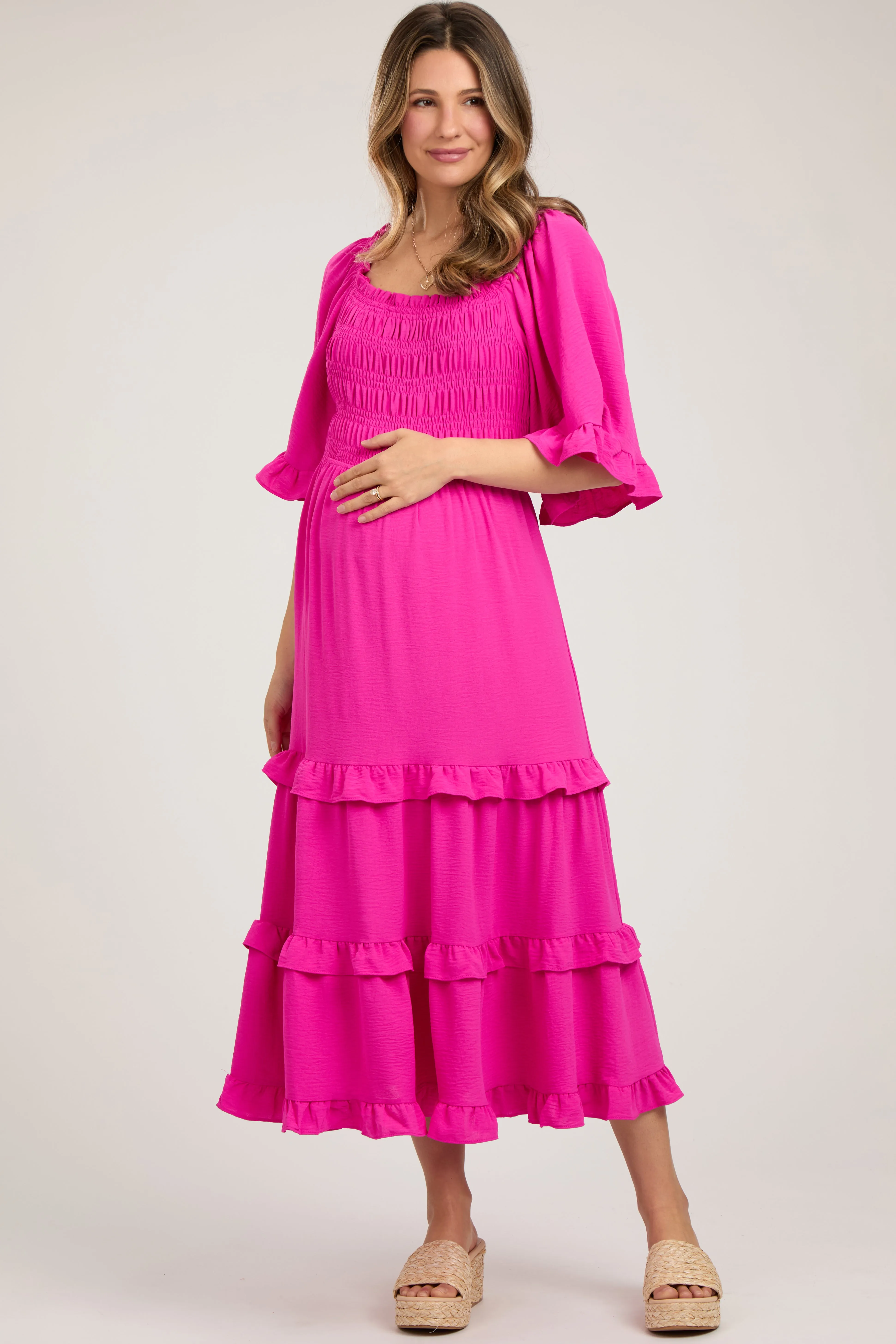 Fuchsia Smocked Ruffle Tiered Maternity Midi Dress sold by Pinkblush