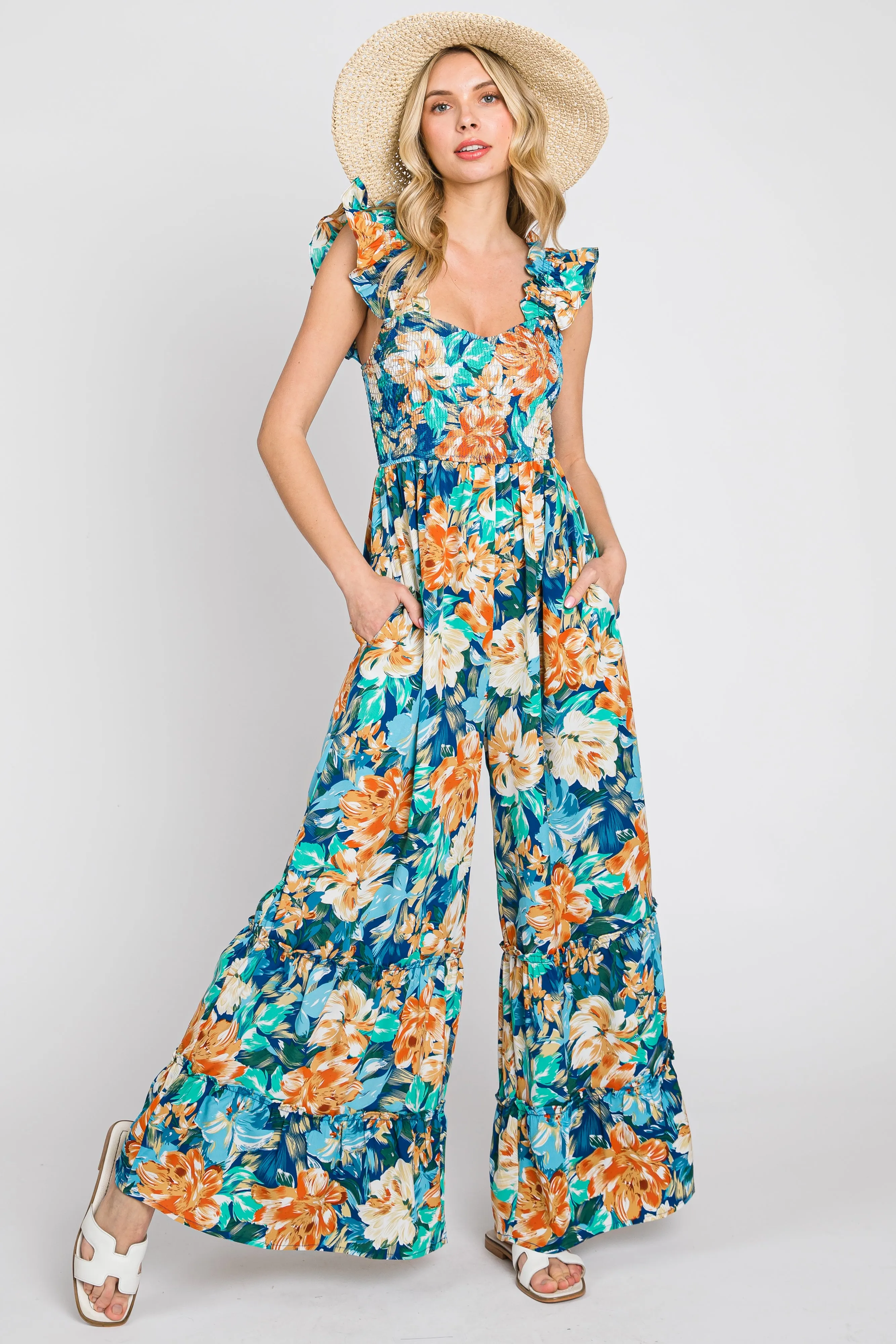 Navy Floral Smocked Ruffle Accent Jumpsuit sold by Pinkblush