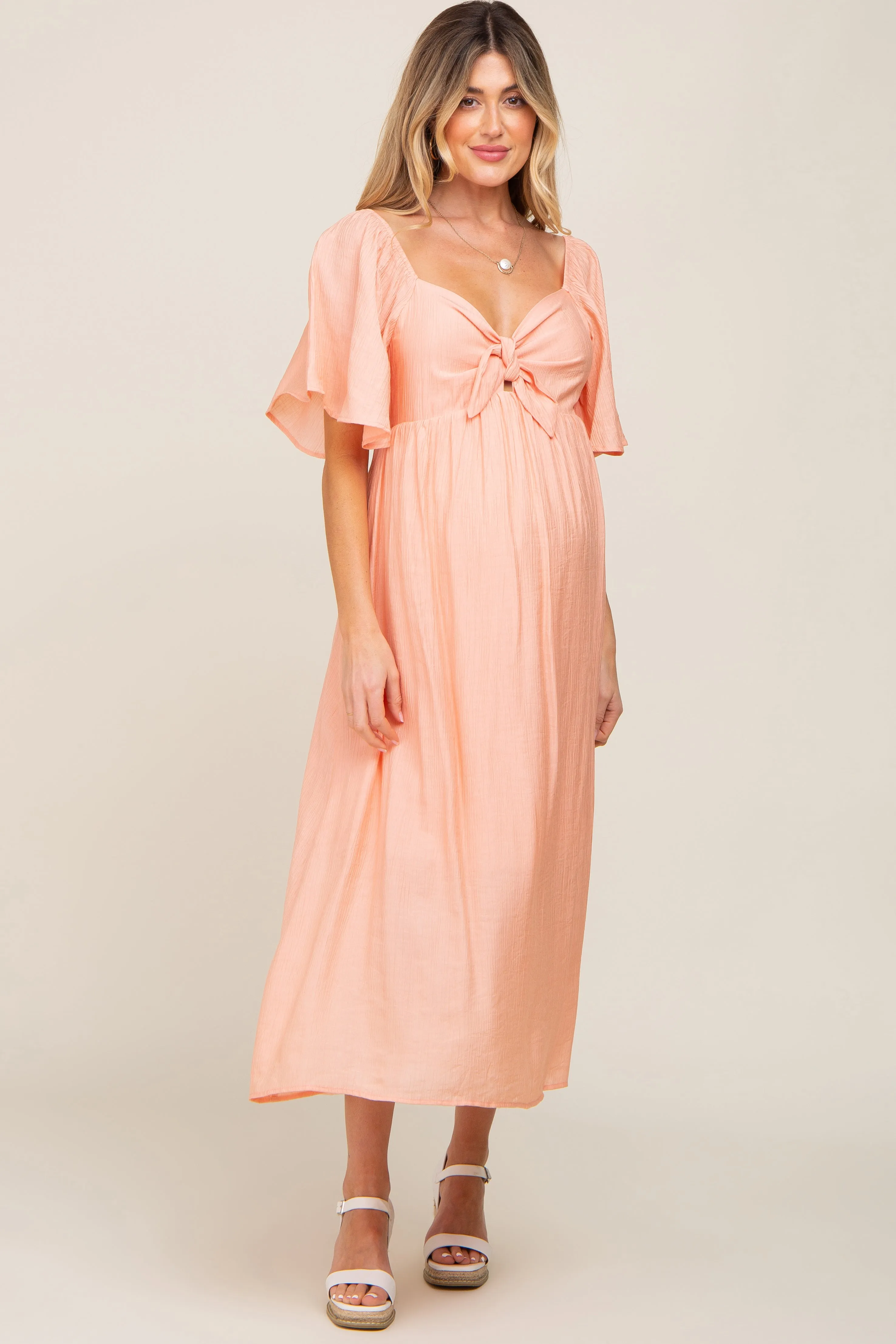 Peach Front Tie Ruffle Sleeve Maternity Midi Dress sold by Pinkblush product image thumbnail 5