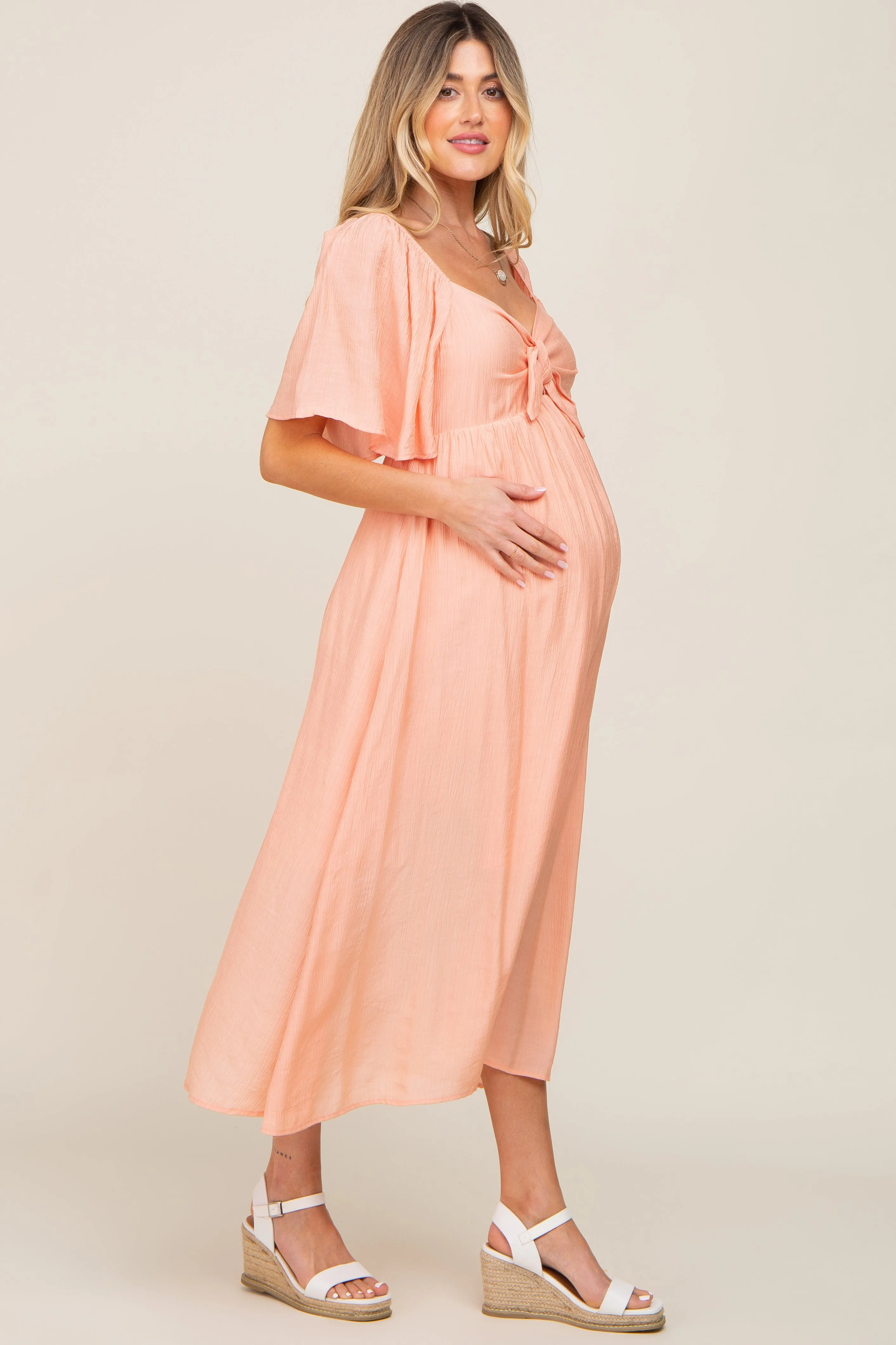 Peach Front Tie Ruffle Sleeve Maternity Midi Dress sold by Pinkblush product image thumbnail 2