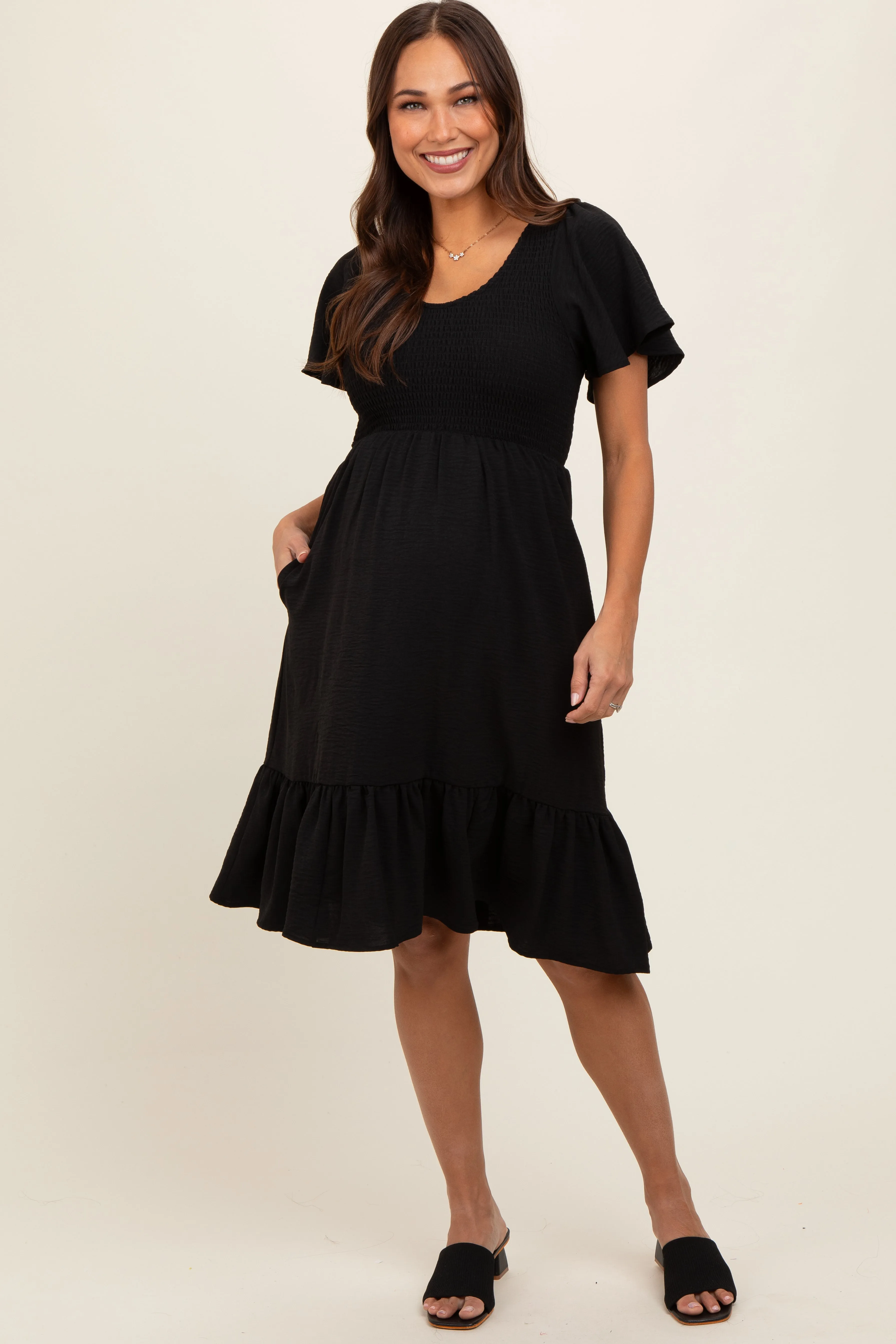 Black Smocked Ruffle Hem Maternity Dress sold by Pinkblush