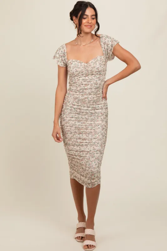 Cream Printed Stretch Knit Ruched Dress sold by Pinkblush