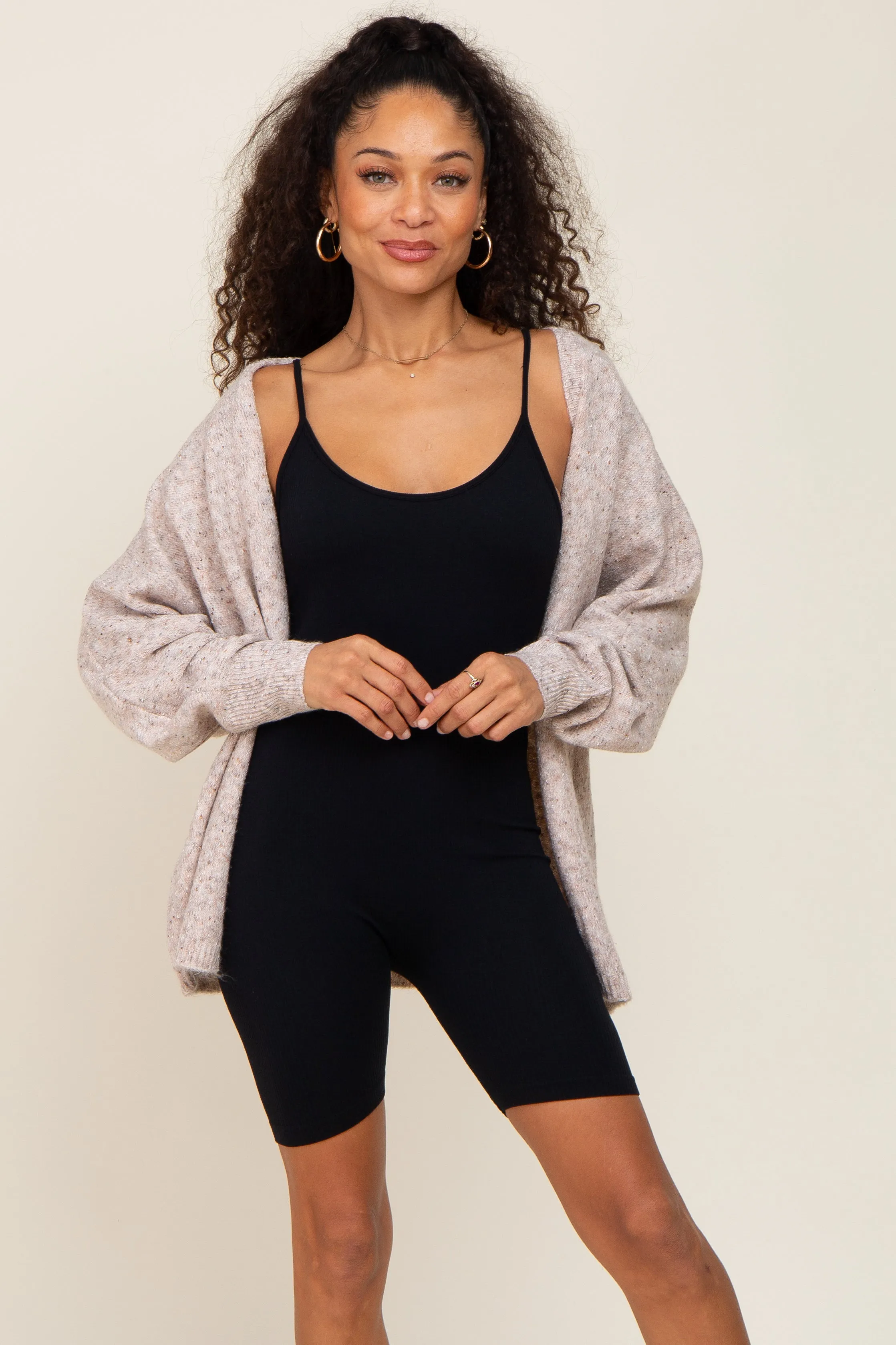 Black Ribbed Biker Short Romper sold by Pinkblush