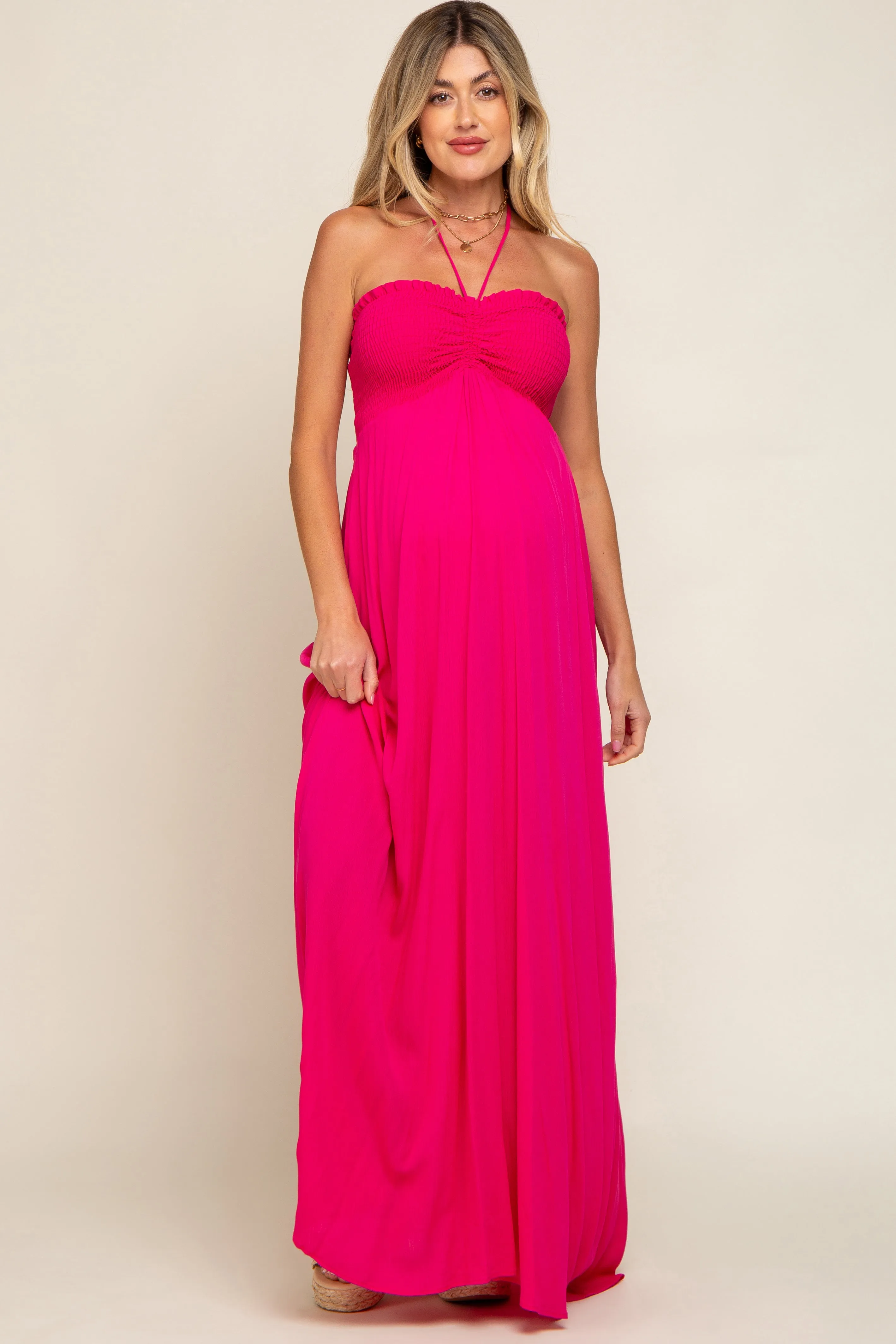 Fuchsia Smocked Halter Maternity Maxi Dress sold by Pinkblush