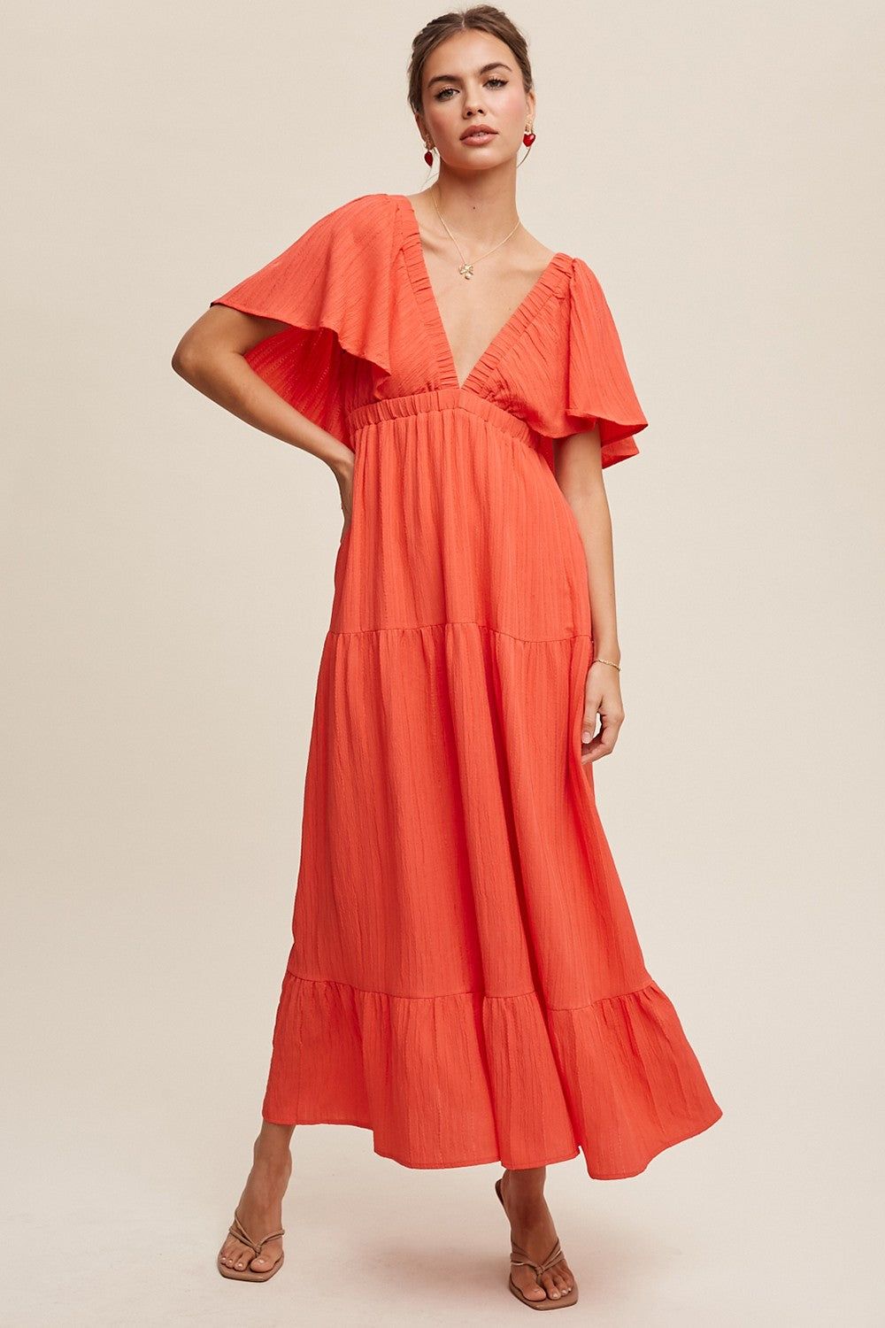 Coral Deep V-Neck Flutter Sleeve Tiered Midi Dress sold by Pinkblush