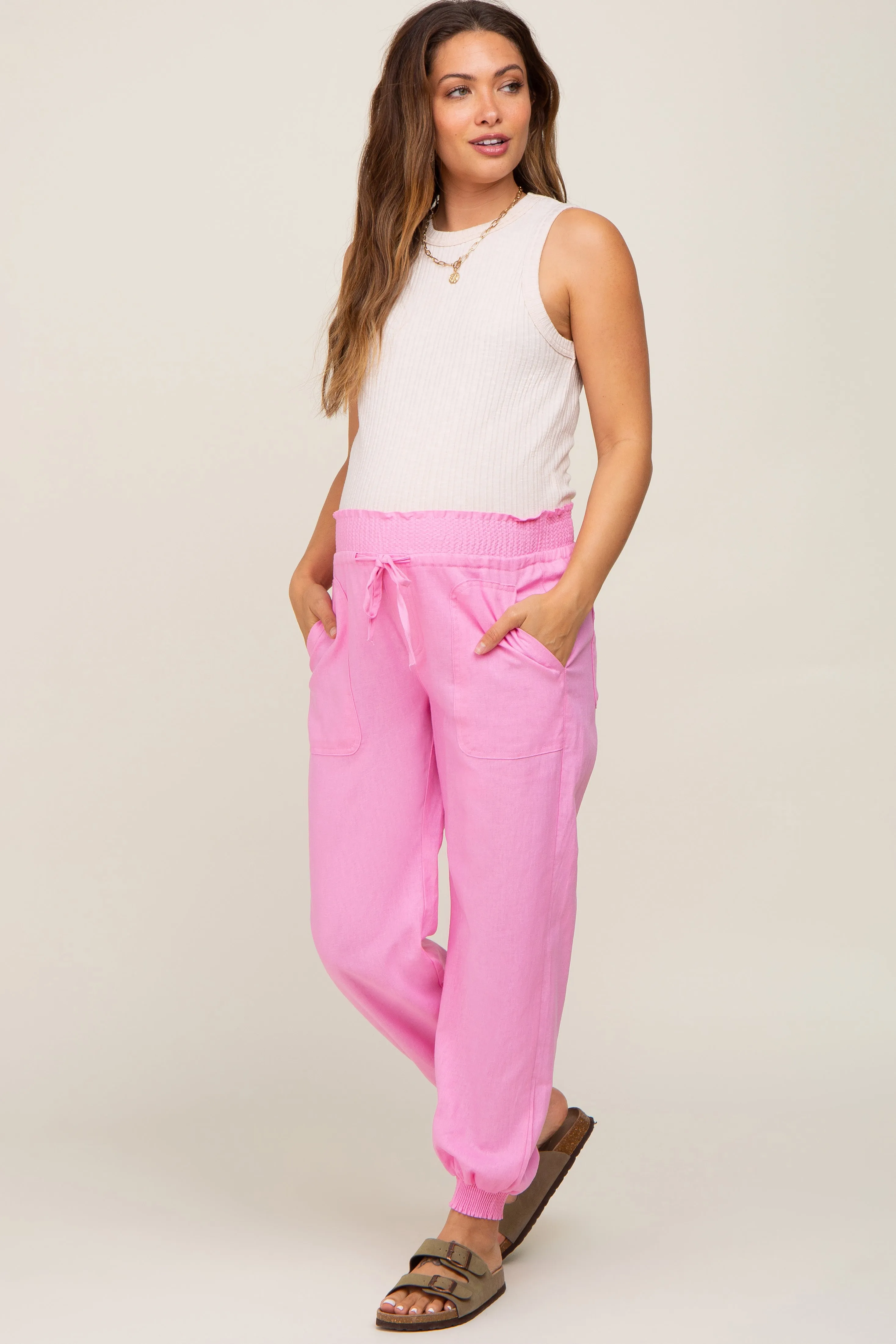 Pink Smocked Maternity Joggers sold by Pinkblush
