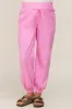 Pink Smocked Maternity Joggers sold by Pinkblush