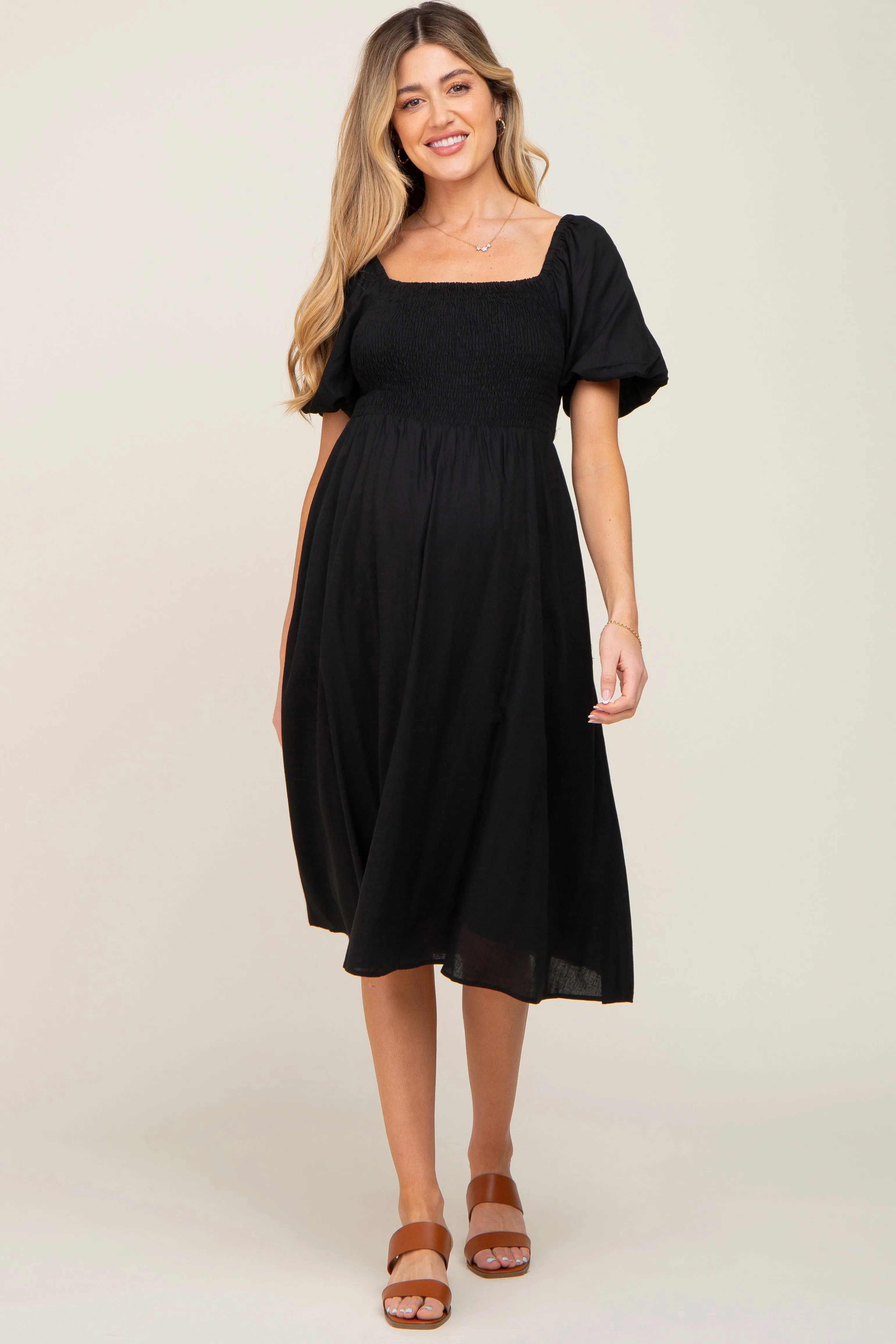 Black Smocked Puff Sleeve Maternity Midi Dress sold by Pinkblush