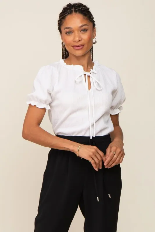 Ivory Ruffle Accent Tie Front Blouse sold by Pinkblush