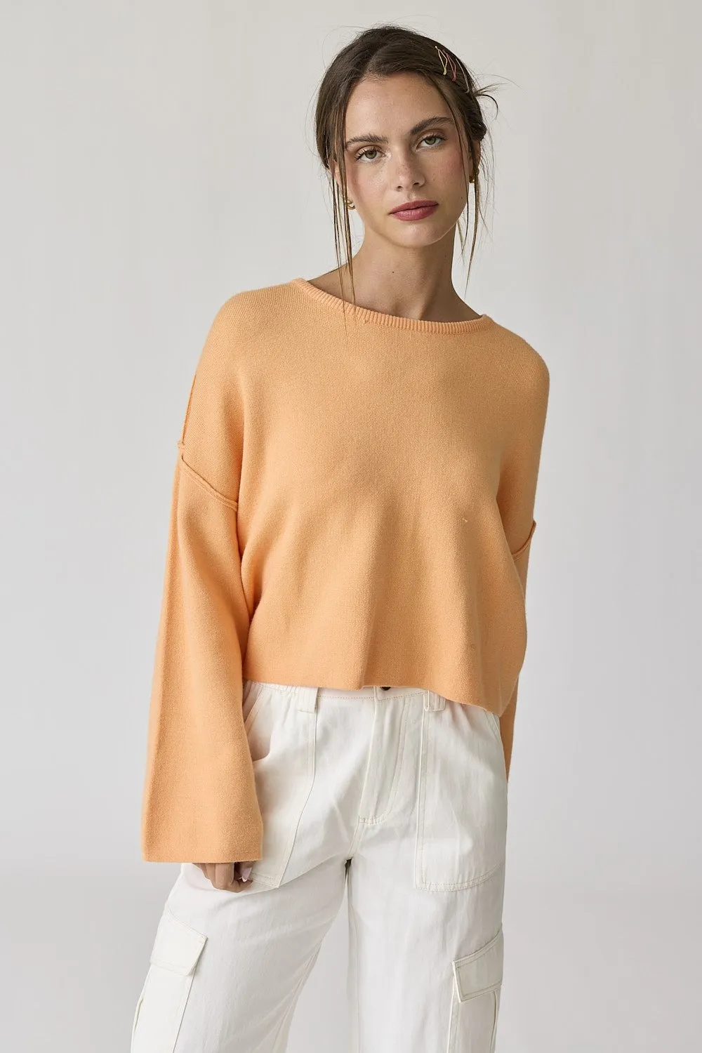 Peach Loose Fit Round Neck Crop Length Knit Top sold by Pinkblush