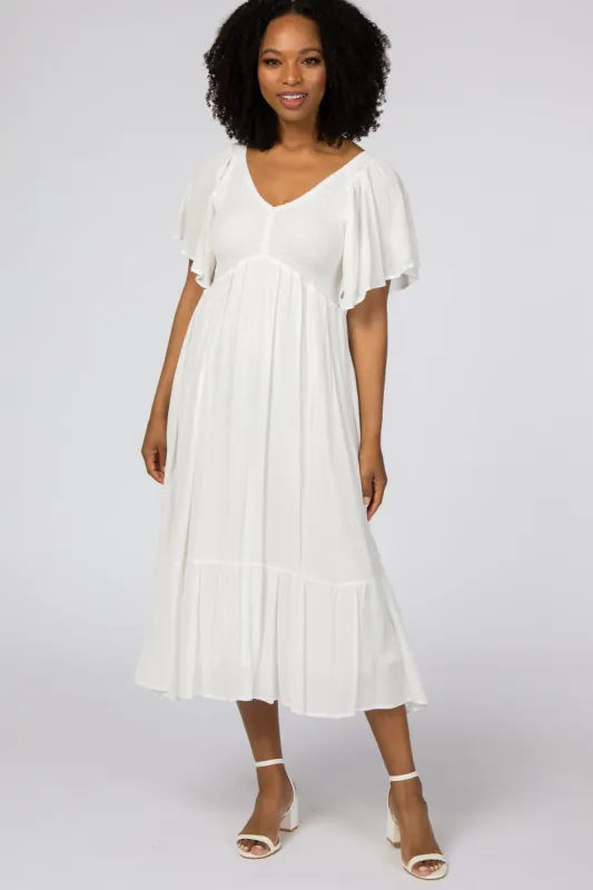 Ivory Smocked Ruffle Dress sold by Pinkblush