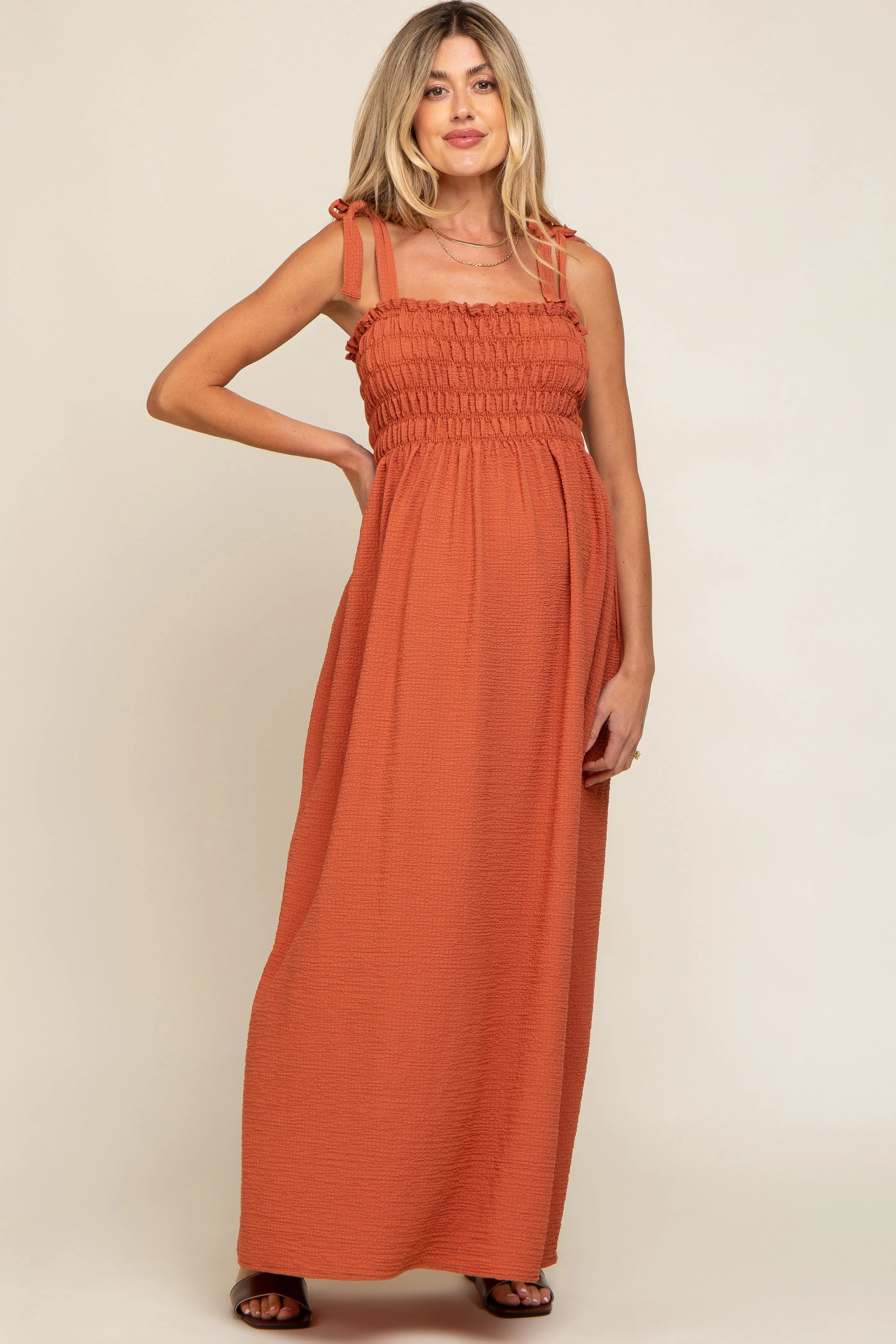 Rust Textured Smocked Shoulder Tie Maternity Maxi Dress sold by Pinkblush
