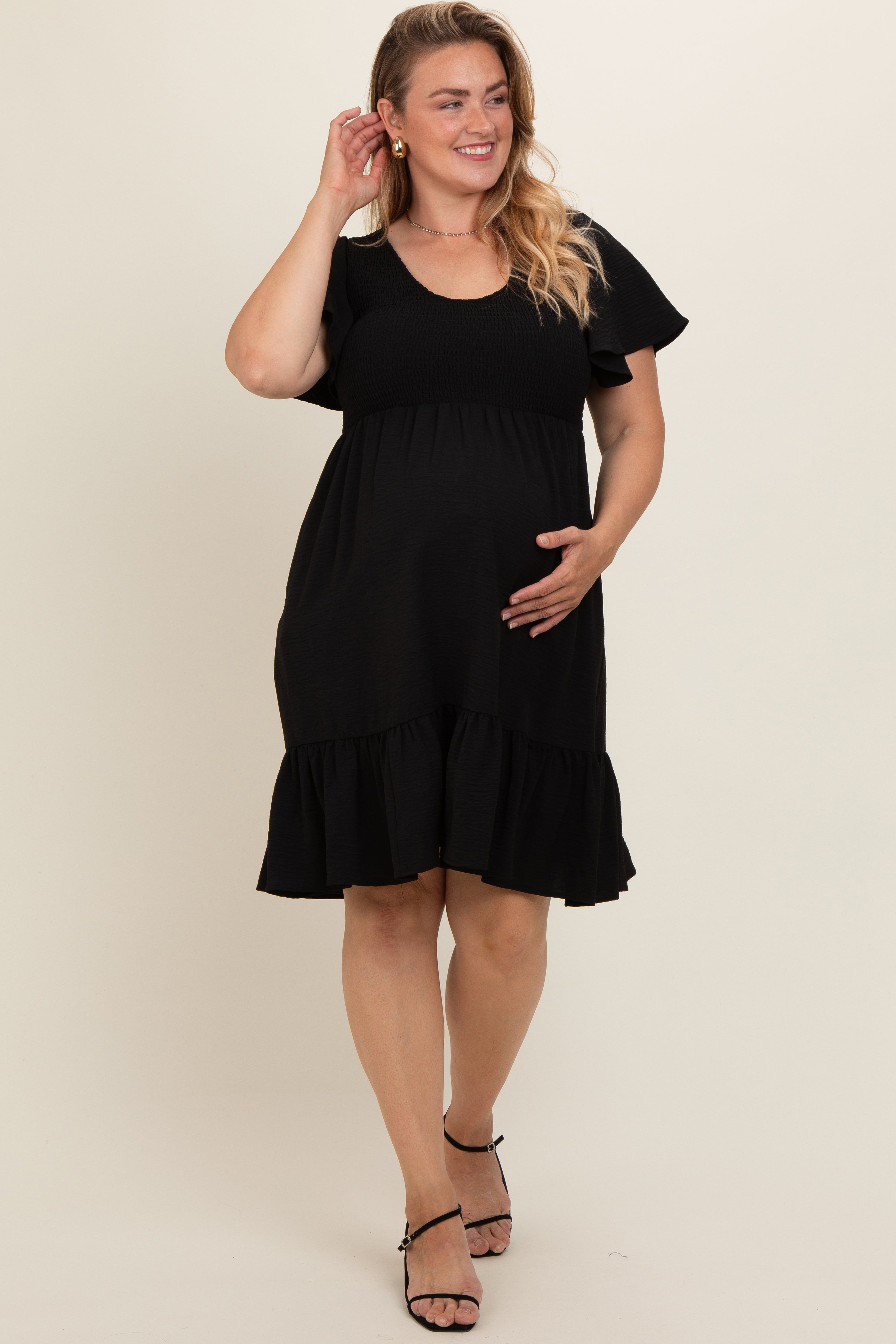 Black Smocked Ruffle Hem Maternity Plus Dress sold by Pinkblush