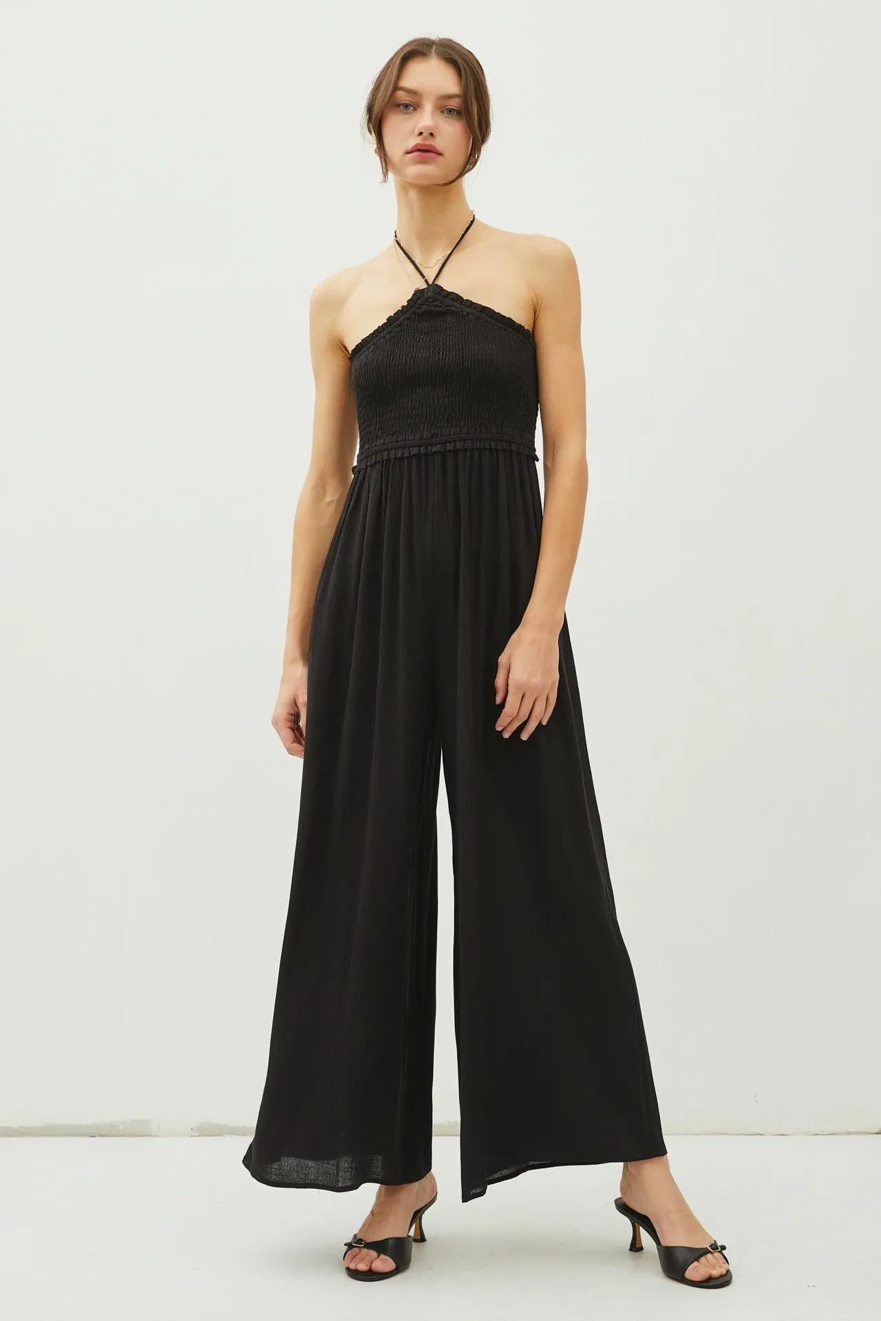 Black Back Cutout Smocked Halter Wide Leg Jumpsuit sold by Pinkblush