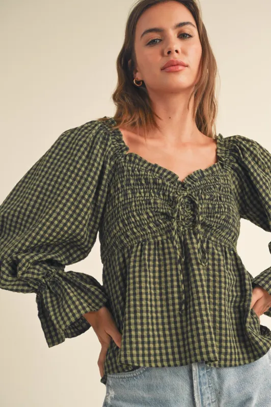 Olive Black Smocked Flounce Top sold by Pinkblush