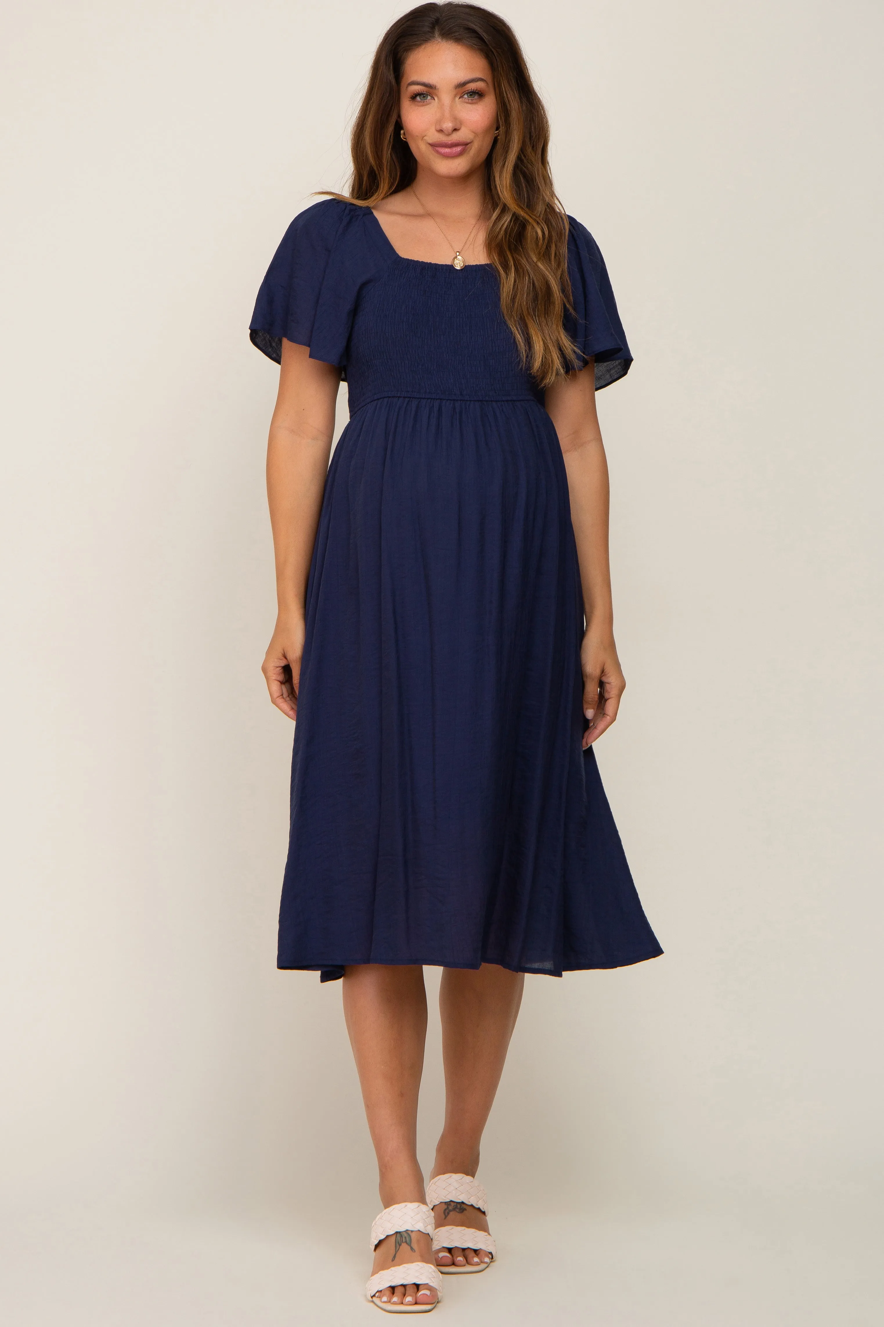 Navy Blue Smocked Square Neck Flutter Short Sleeve Maternity Midi Dress sold by Pinkblush