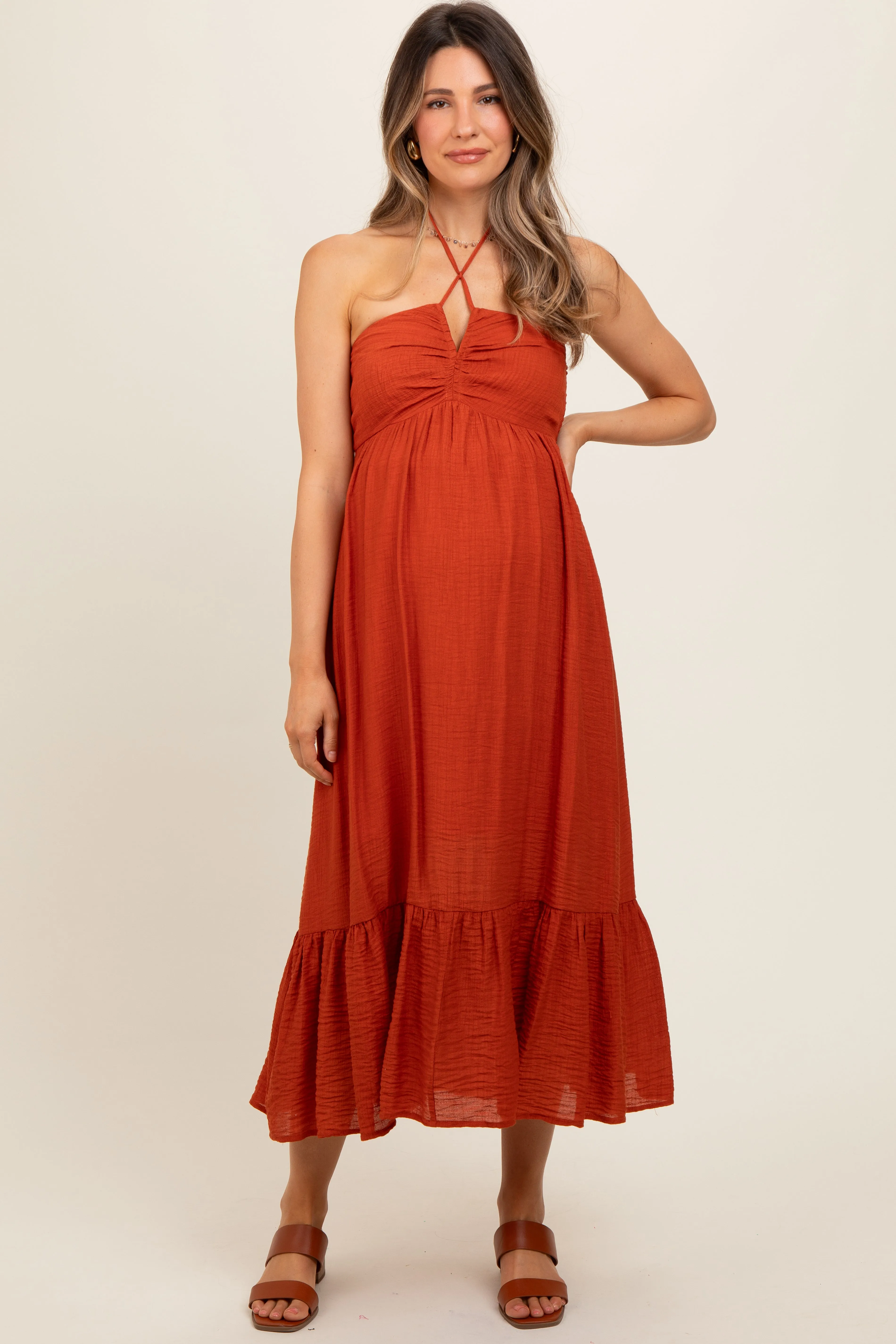 Rust Halter Maternity Midi Dress sold by Pinkblush