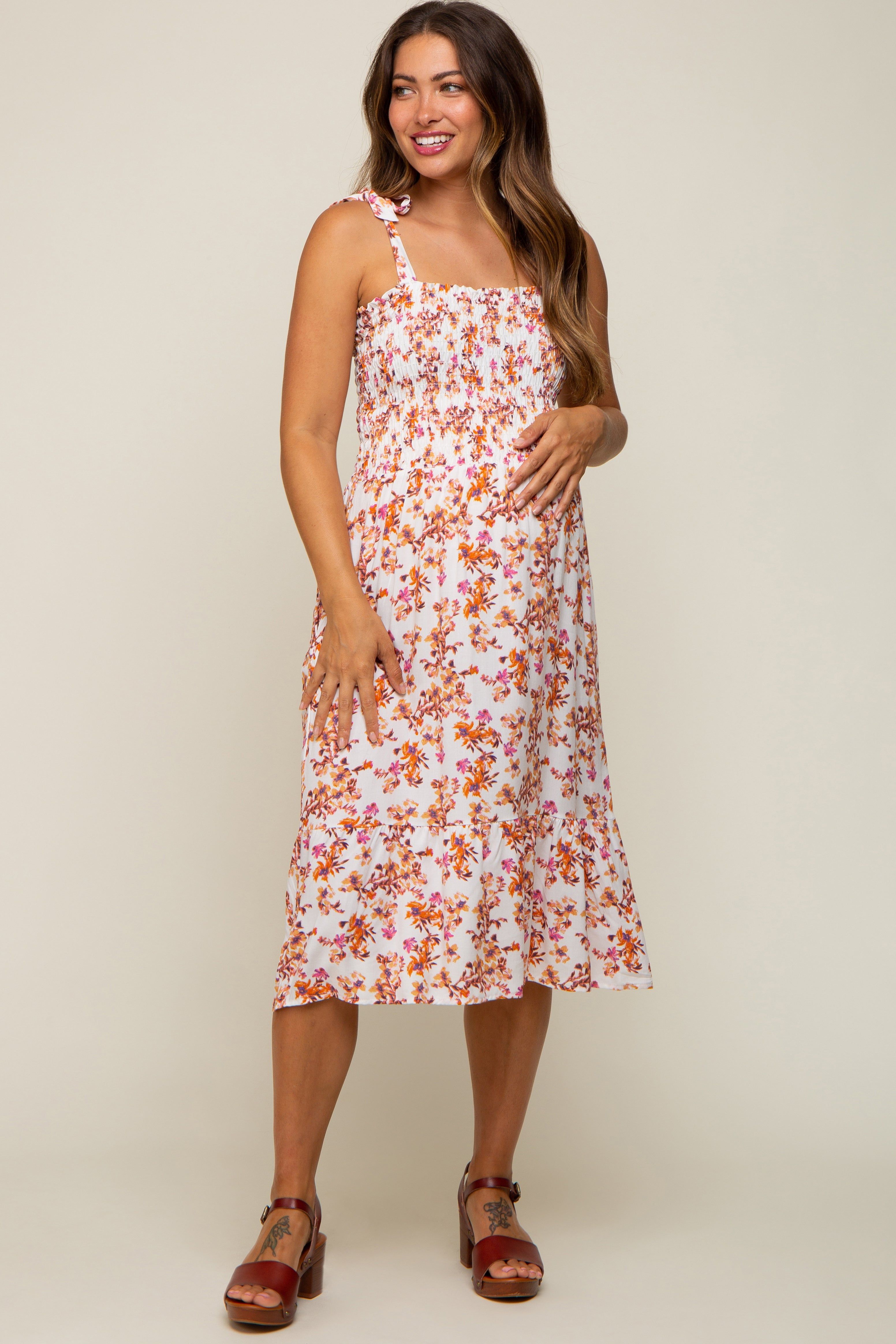 Ivory Floral Shoulder Tie Smocked Maternity Midi Dress sold by Pinkblush