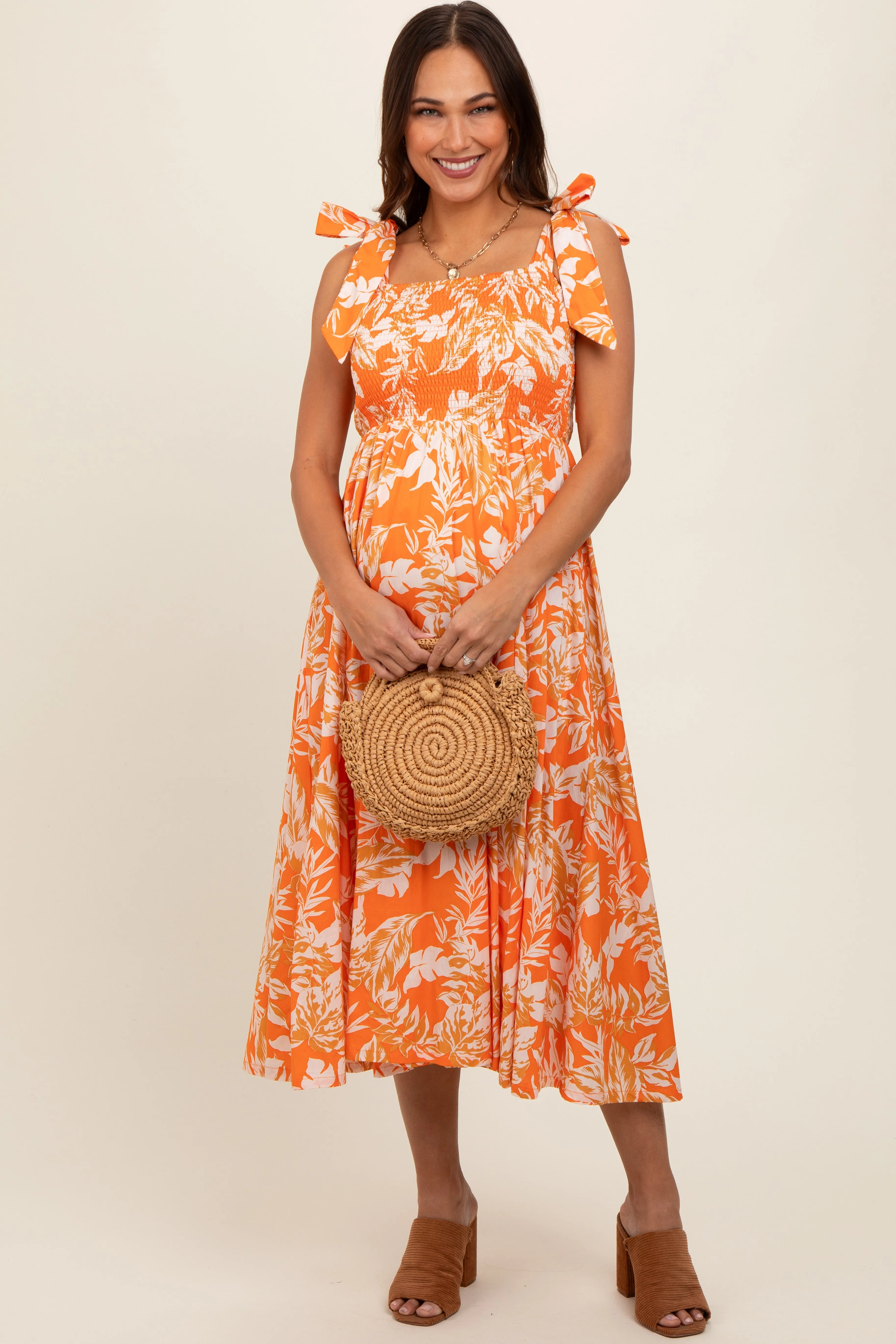 Orange Floral Smocked Tie Shoulder Maternity Midi Dress sold by Pinkblush product image thumbnail 2