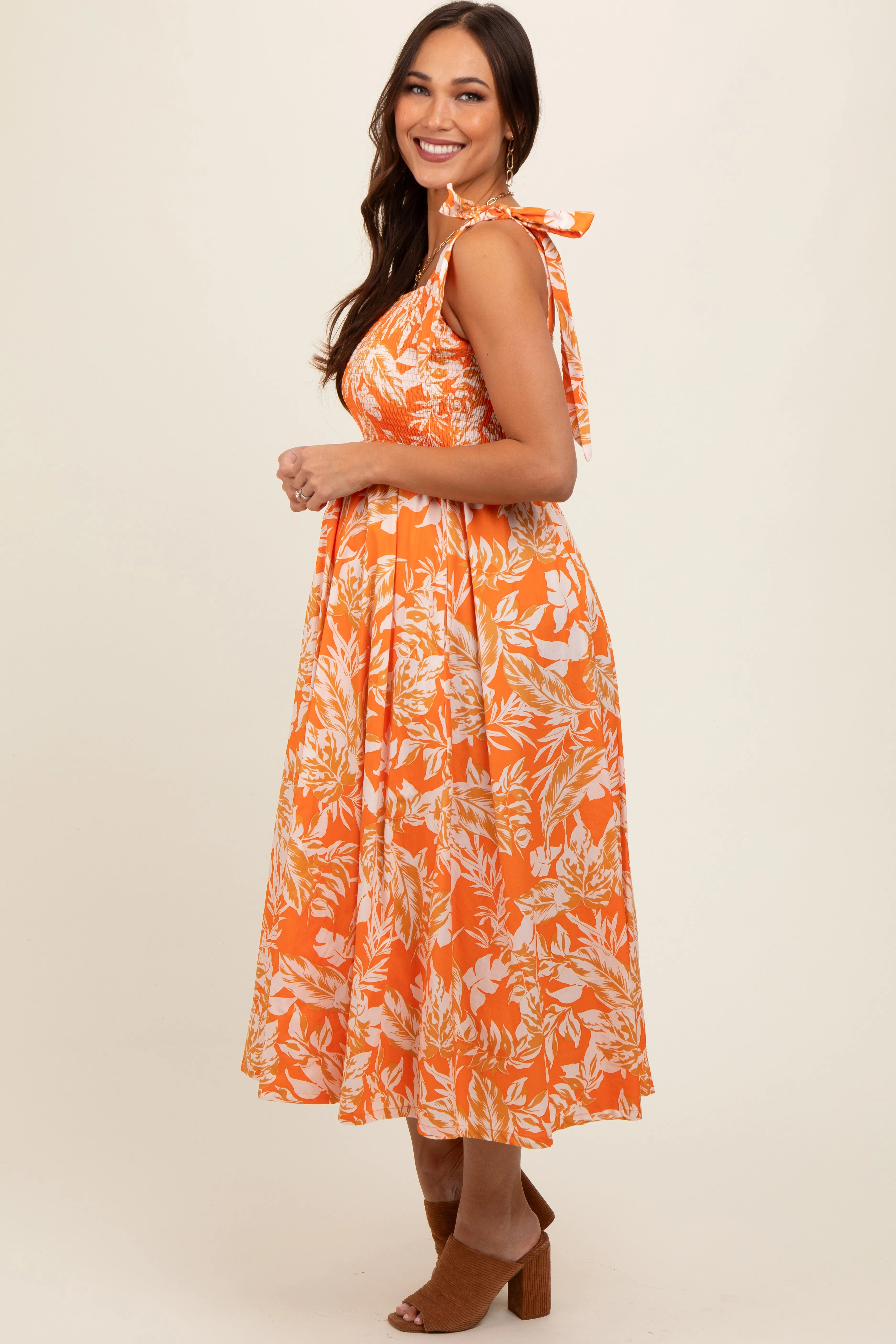 Orange Floral Smocked Tie Shoulder Maternity Midi Dress sold by Pinkblush product image thumbnail 3