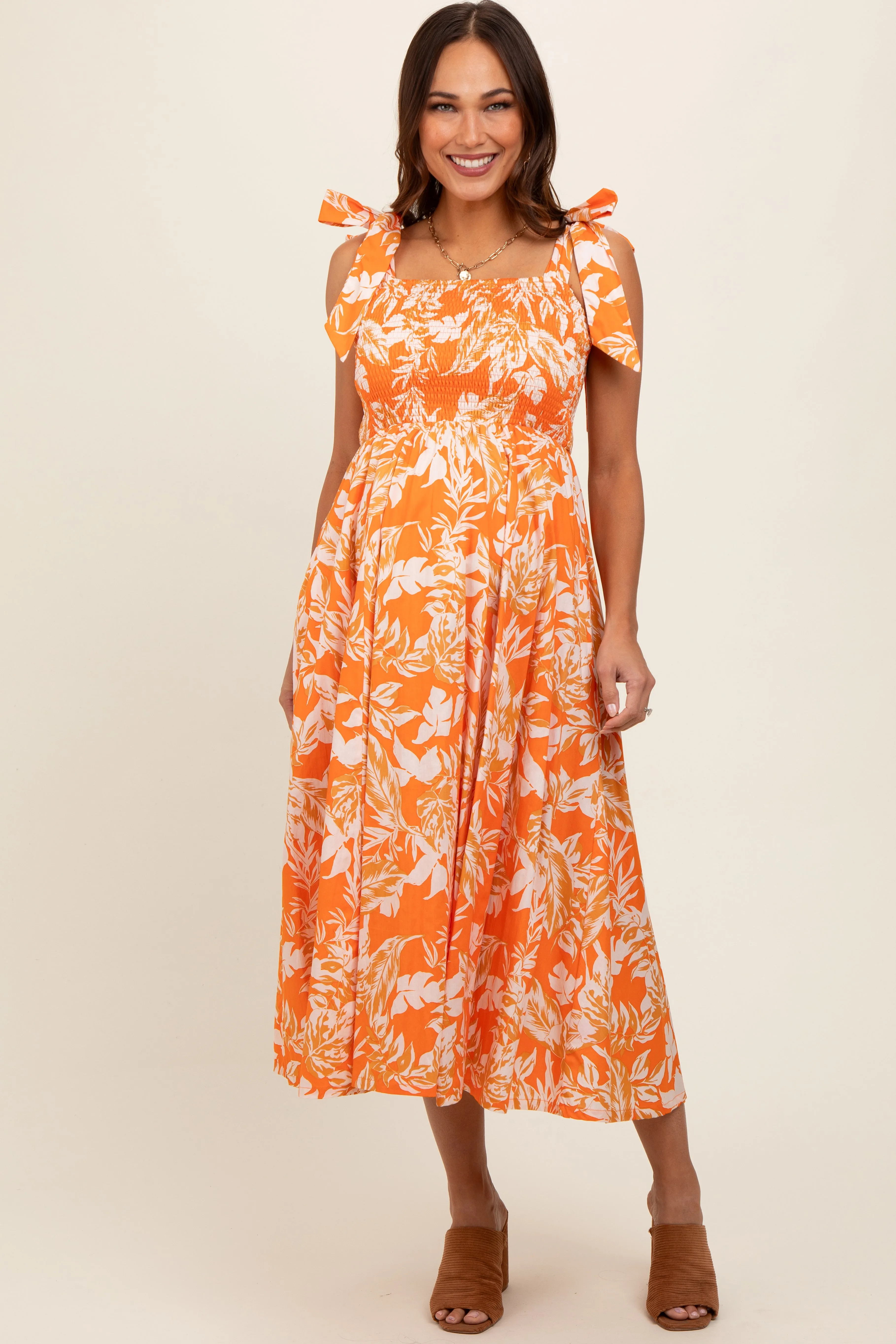 Orange Floral Smocked Tie Shoulder Maternity Midi Dress sold by Pinkblush