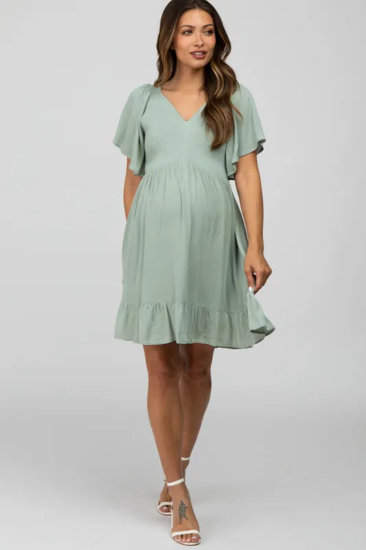 Mint Green Smocked Front Ruffle Hem Maternity Dress sold by Pinkblush