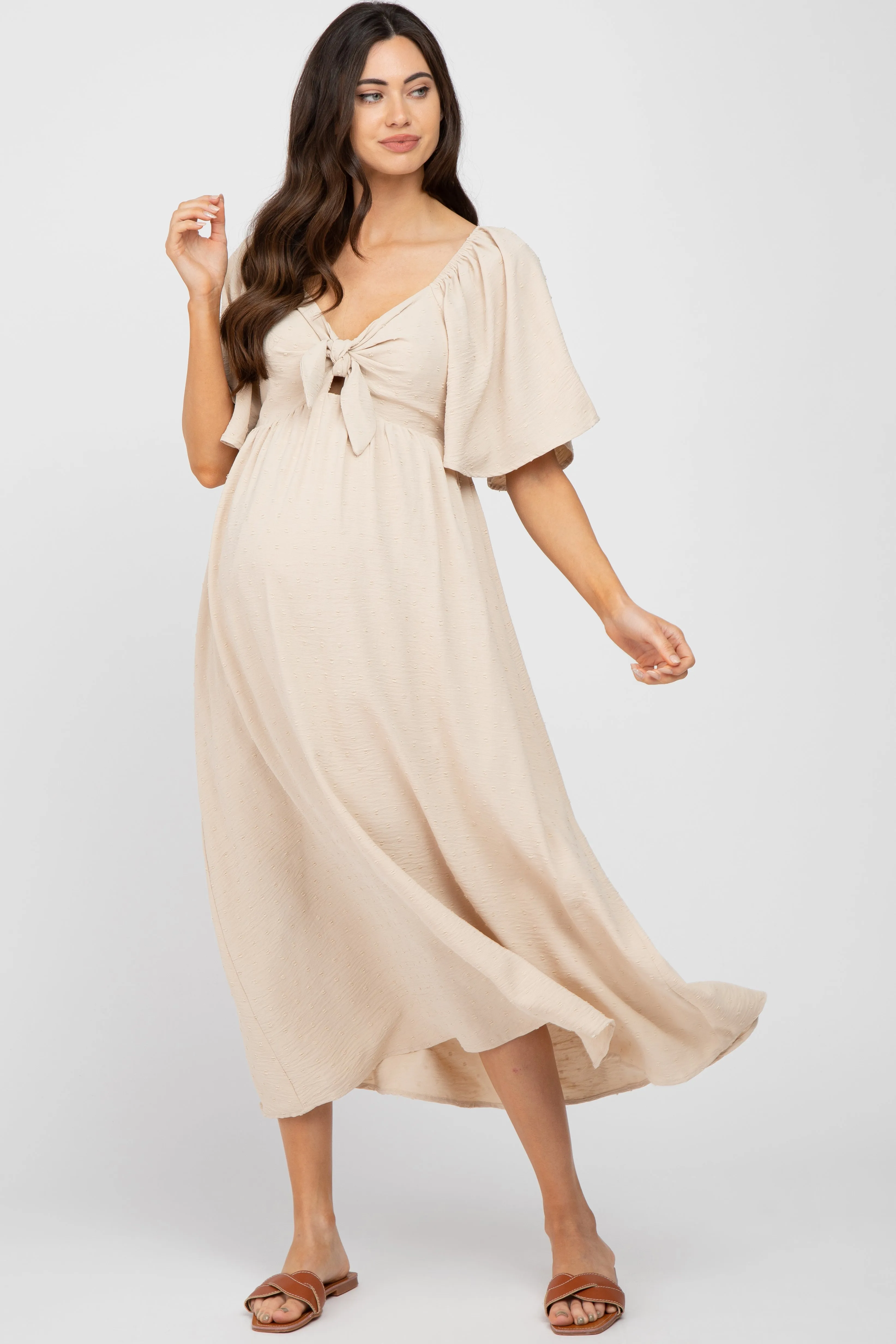 Beige Textured Dot Front Tie Ruffle Sleeve Maternity Midi Dress sold by Pinkblush