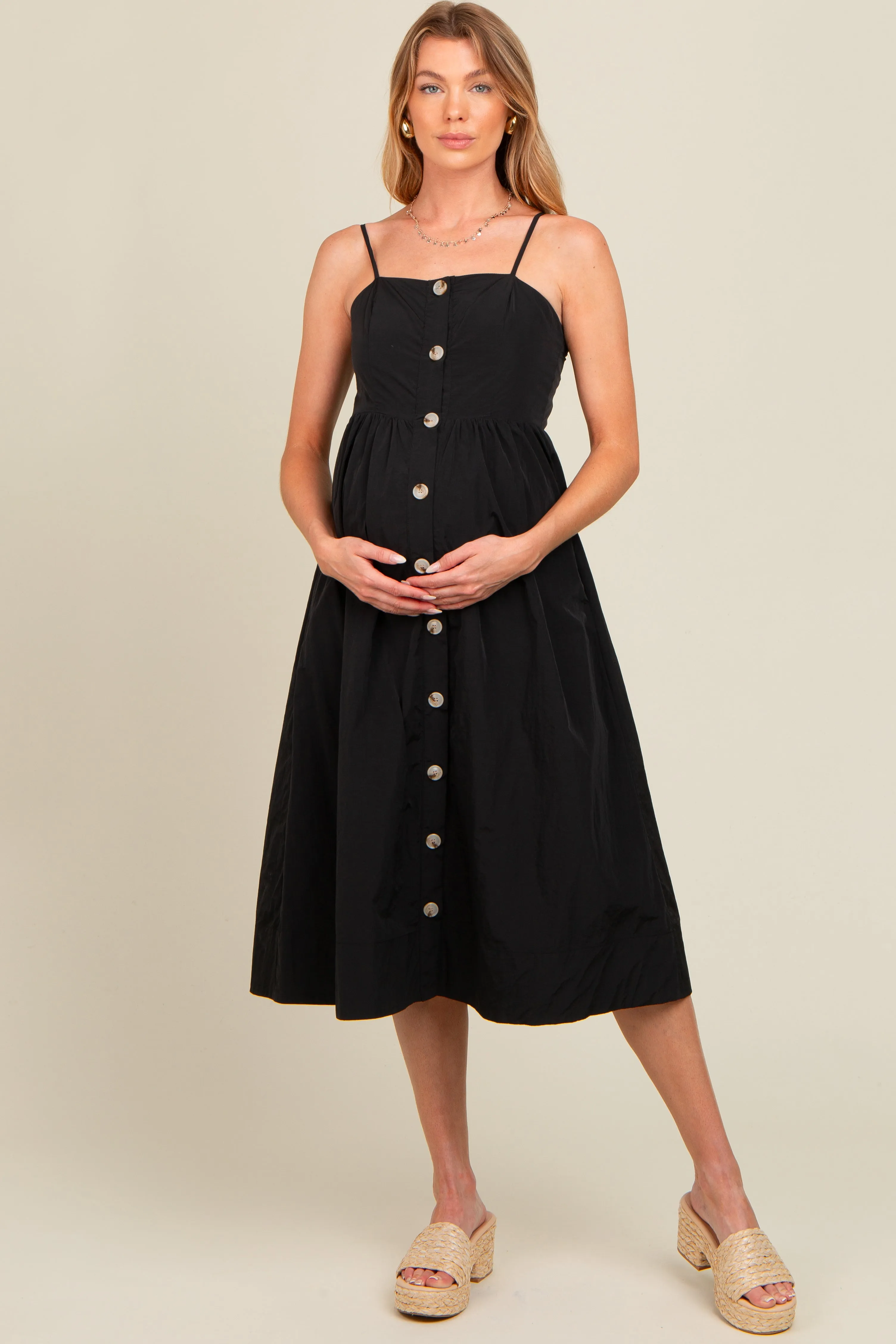 Black Sleeveless Button Down Maternity Midi Dress sold by Pinkblush