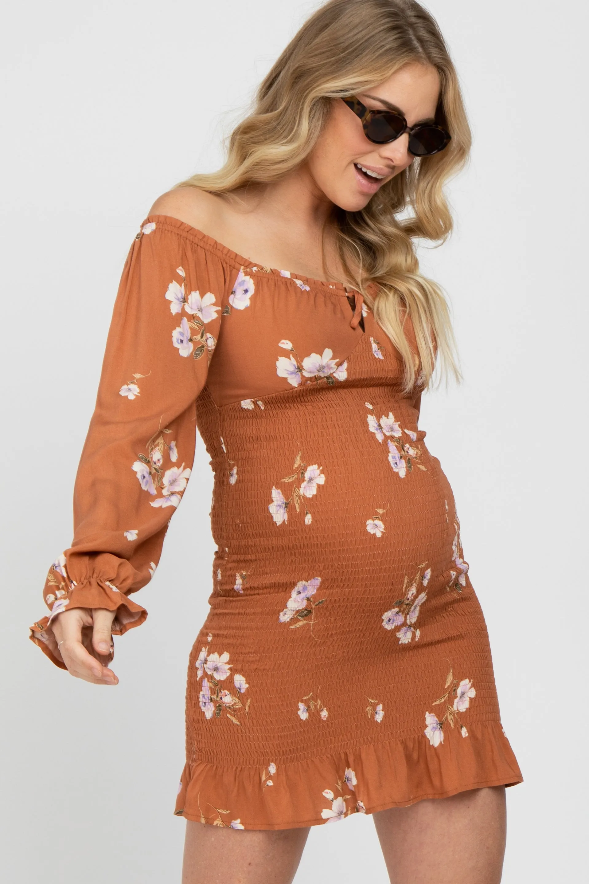 Camel Floral Long Sleeve Smocked Maternity Mini Dress sold by Pinkblush