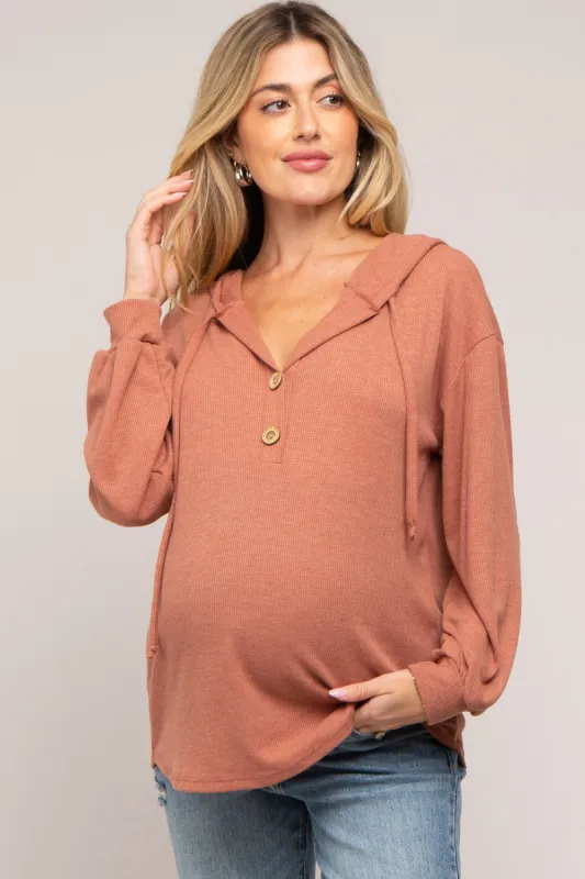 Rust Button Accent Hooded Maternity Henley Top sold by Pinkblush