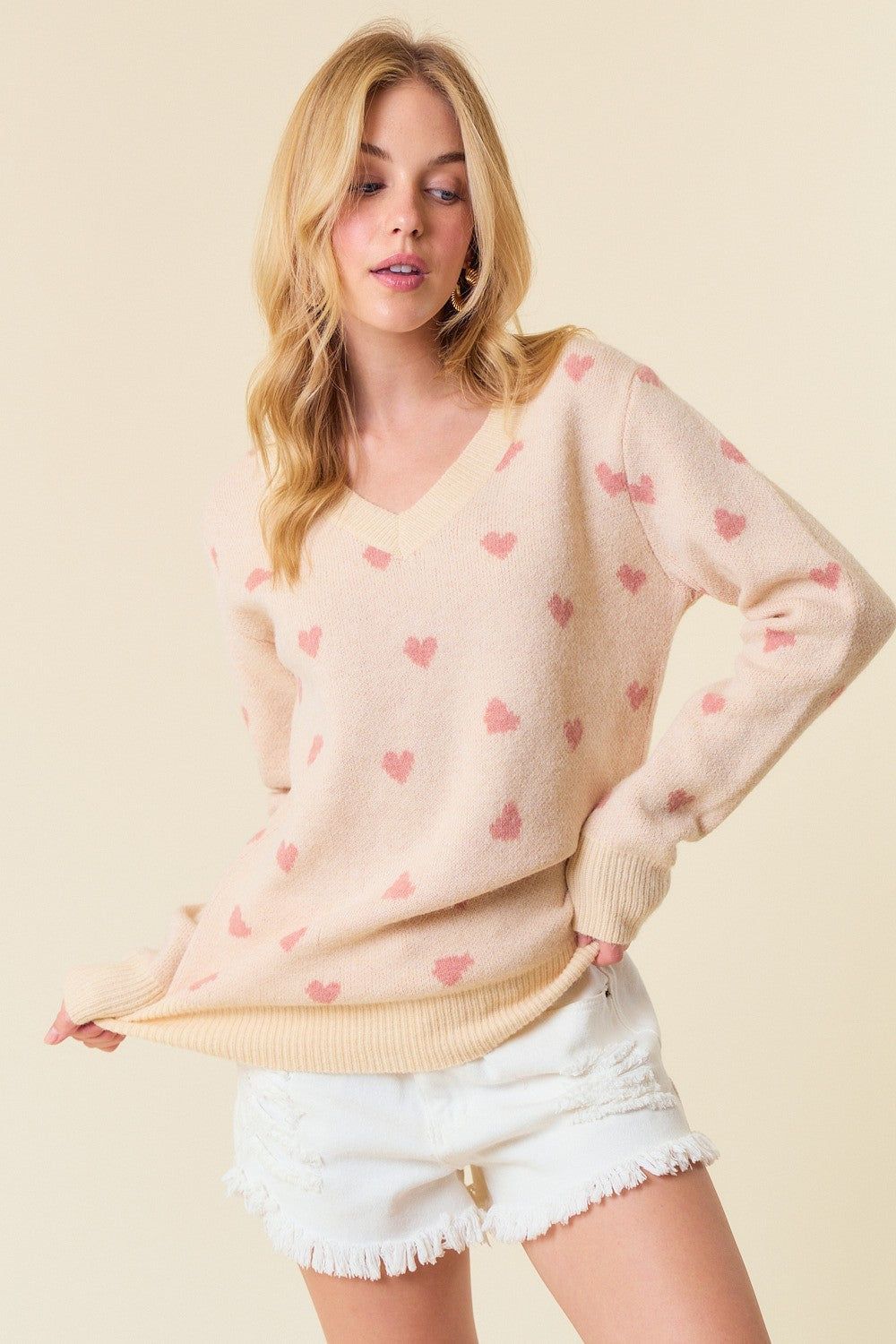 Cream Heart Print Knit Sweater sold by Pinkblush