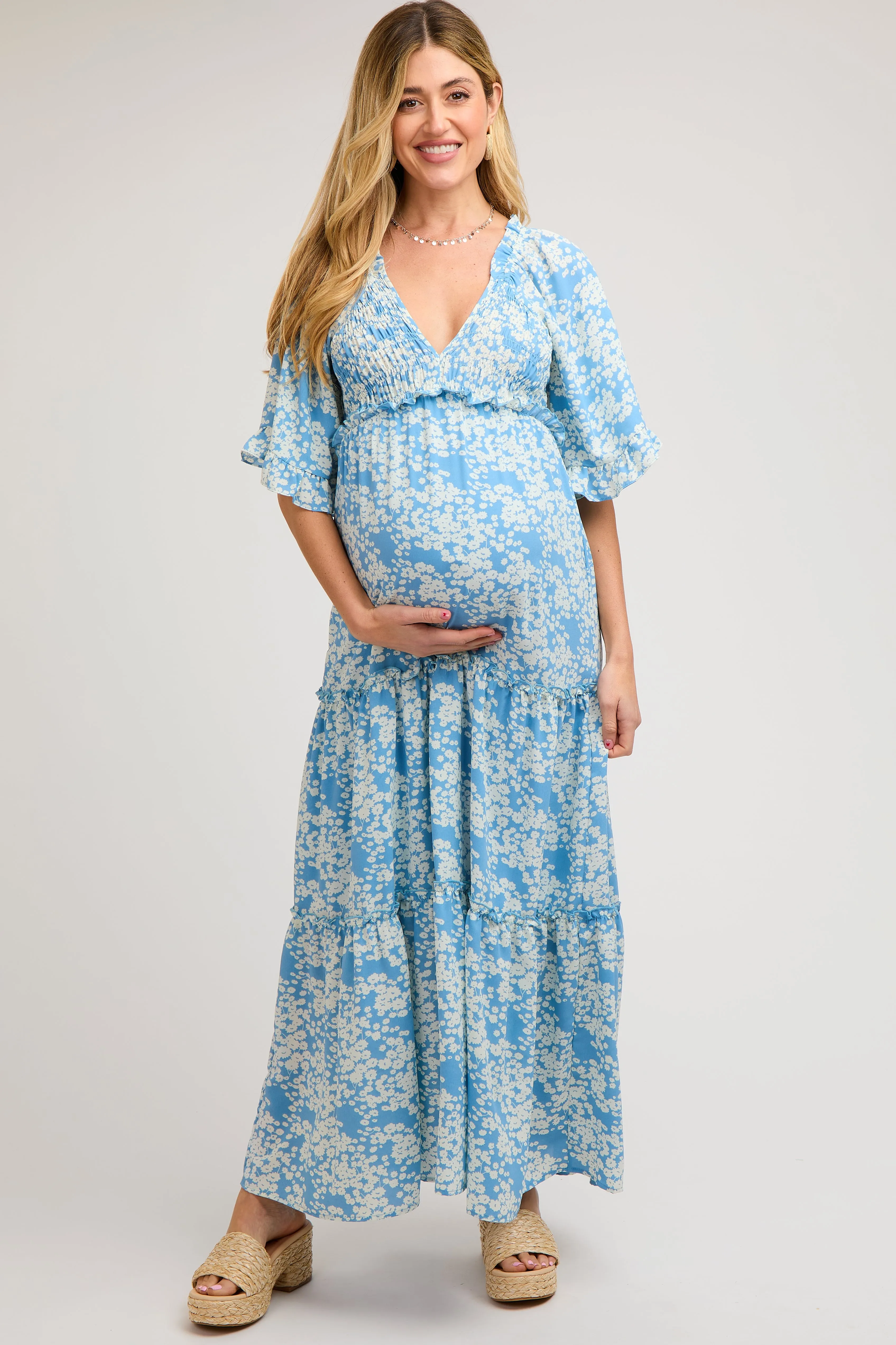 Blue Floral Smocked V-Neck Ruffle Tiered Maternity Maxi Dress sold by Pinkblush