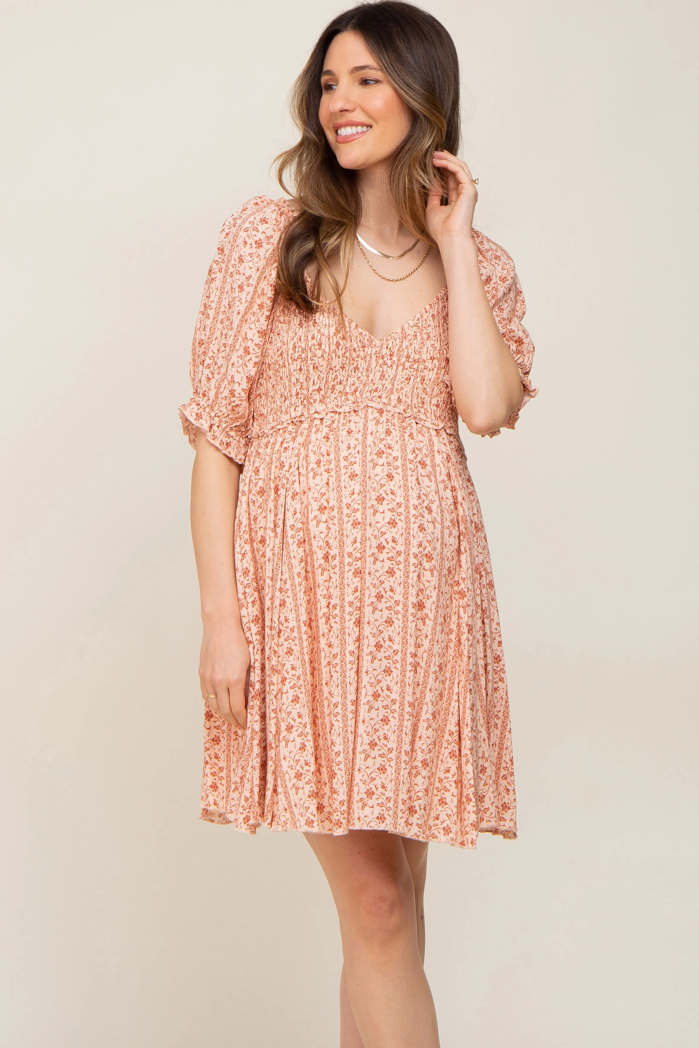 Peach Floral Puff Sleeve Smocked Maternity Mini Dress sold by Pinkblush product image thumbnail 2