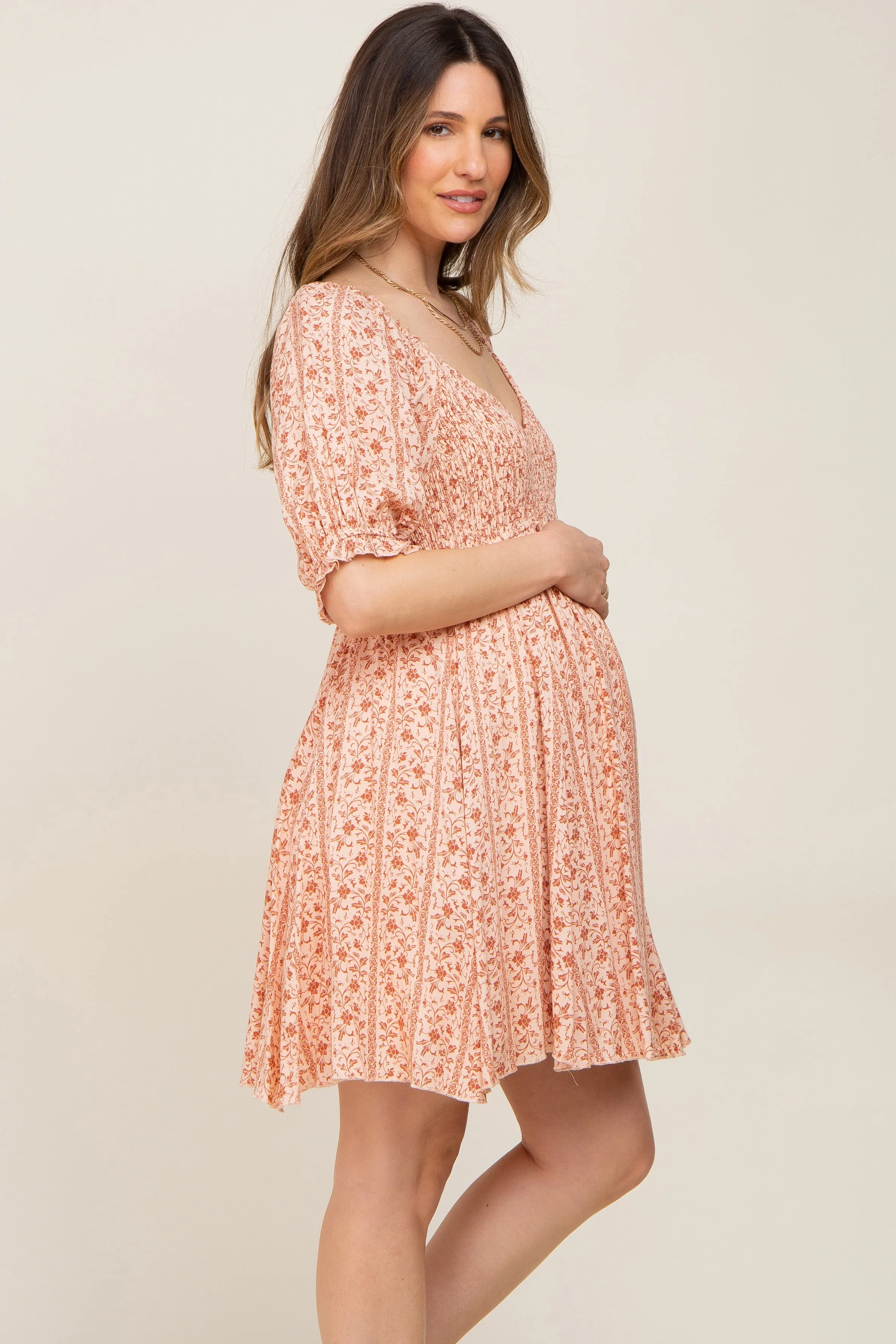 Peach Floral Puff Sleeve Smocked Maternity Mini Dress sold by Pinkblush product image thumbnail 3