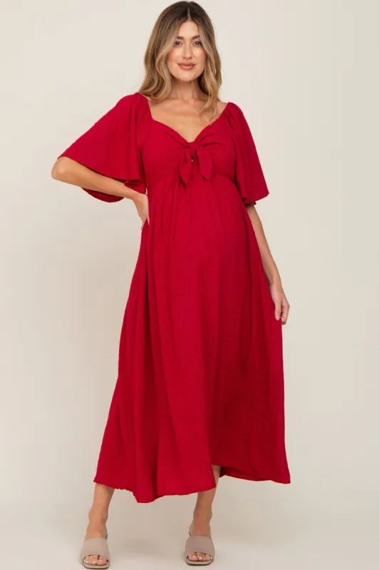 Burgundy Textured Dot Front Tie Ruffle Sleeve Maternity Midi Dress sold by Pinkblush