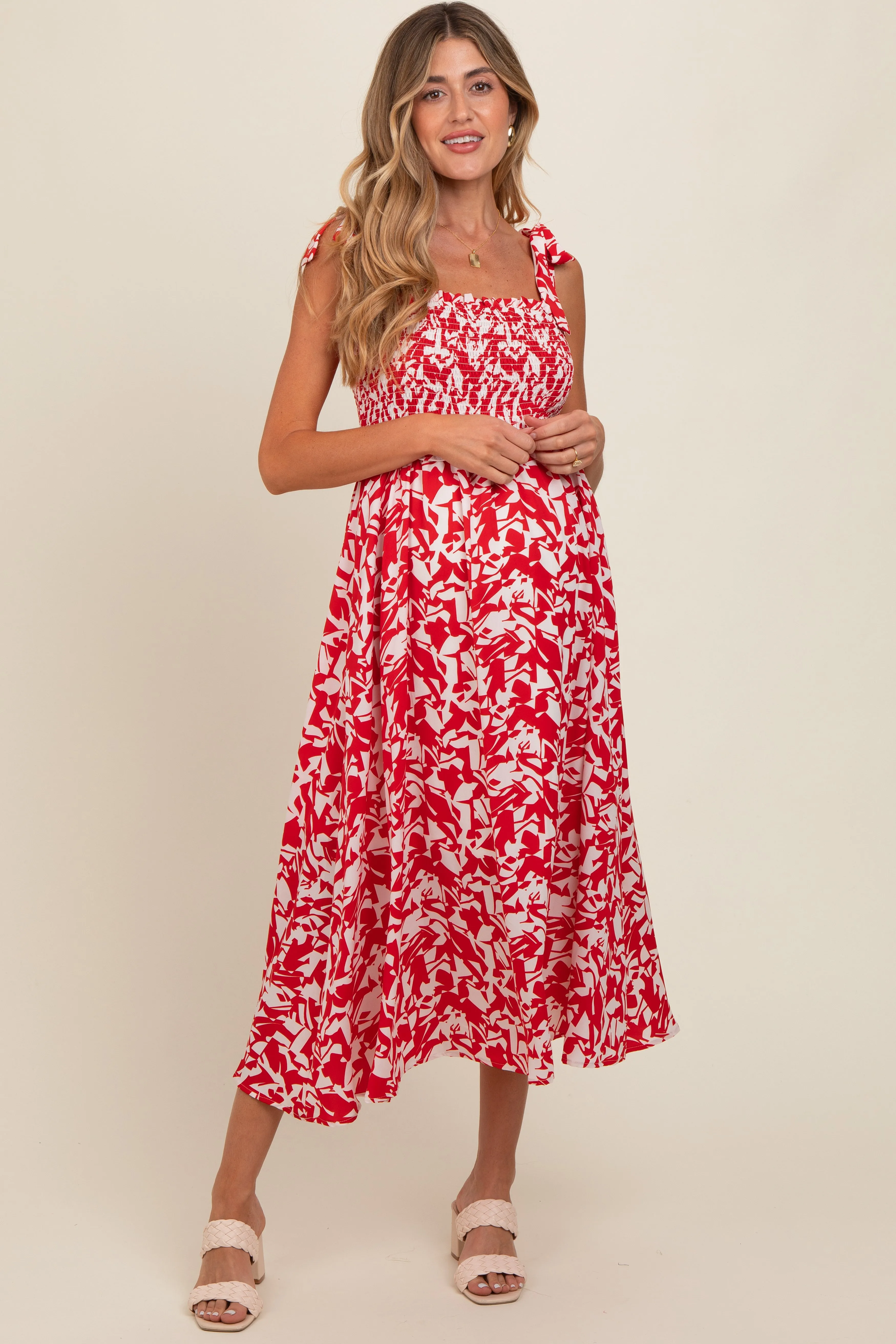 Red Printed Smocked Shoulder Tie Maternity Midi Dress sold by Pinkblush