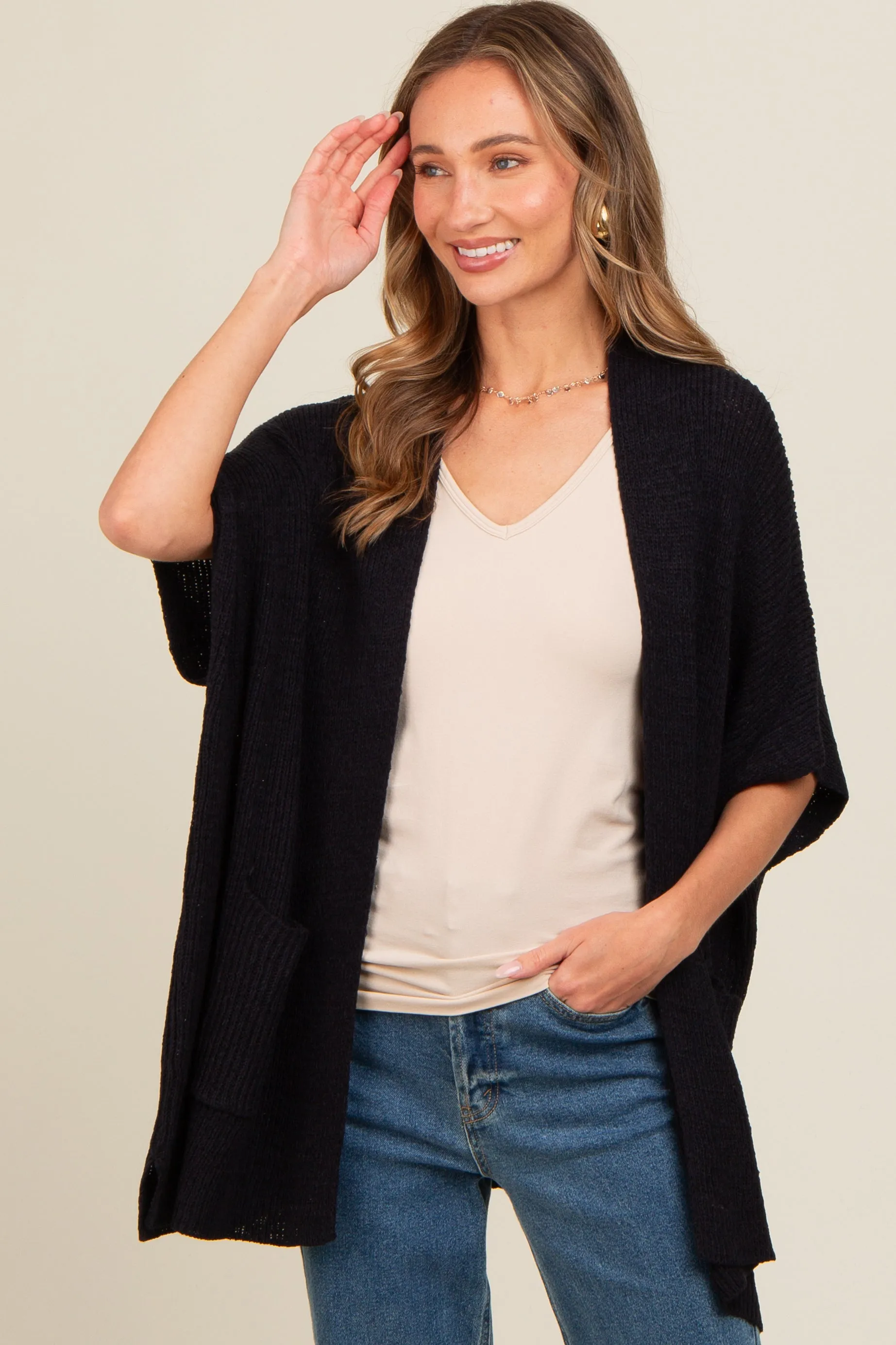 Black Drop Shoulder Side Pocket 3/4 Sleeve Cardigan sold by Pinkblush