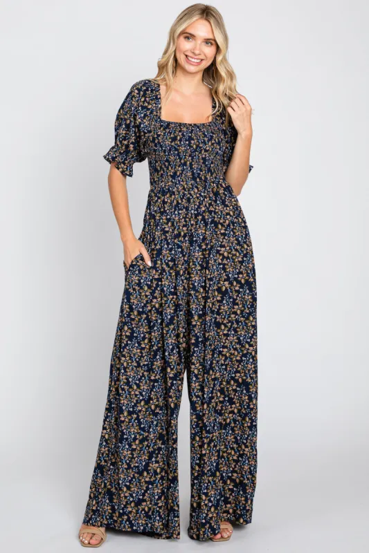 Navy Floral Smocked Jumpsuit sold by Pinkblush