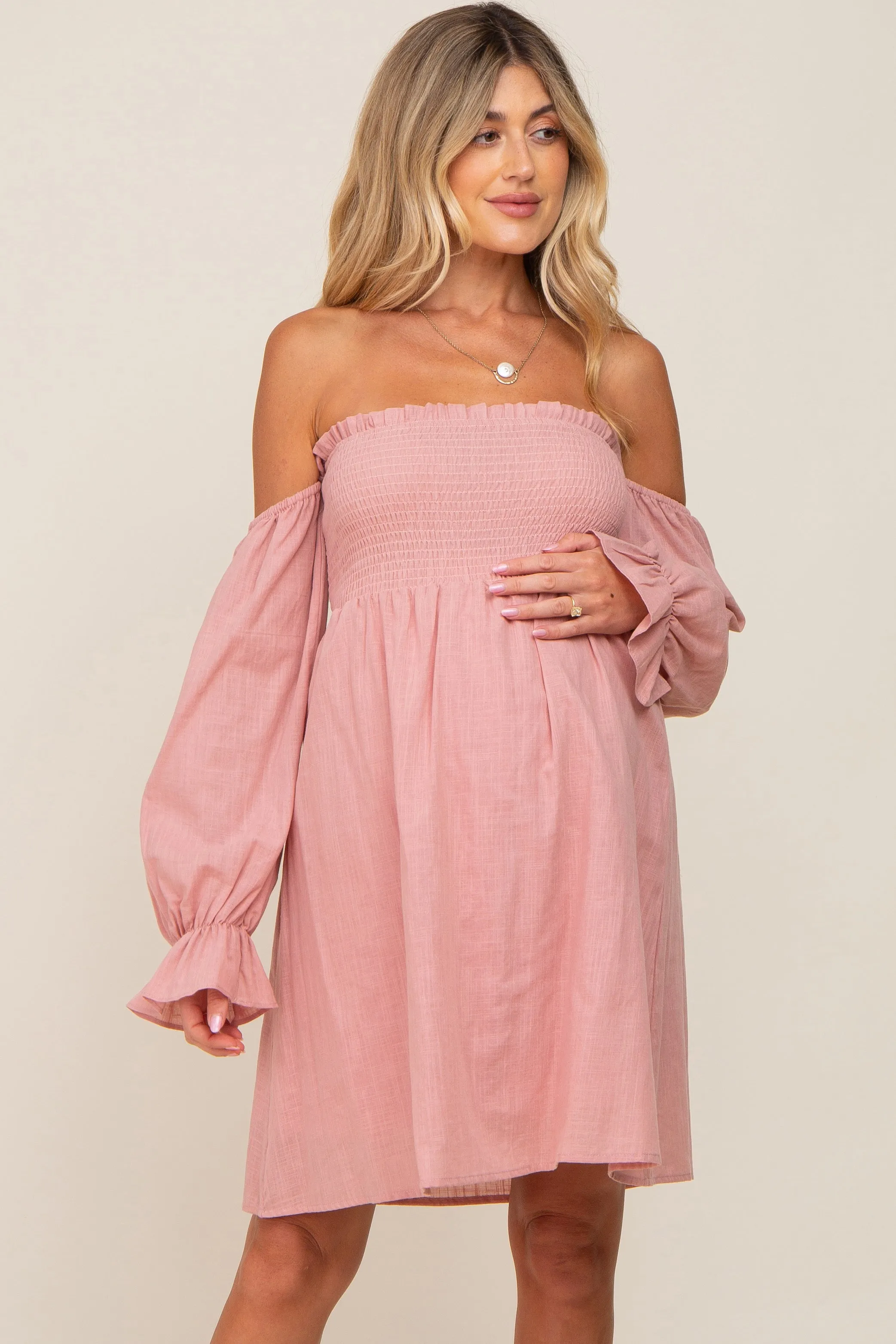 Pink Smocked Off Shoulder Long Sleeve Maternity Dress sold by Pinkblush