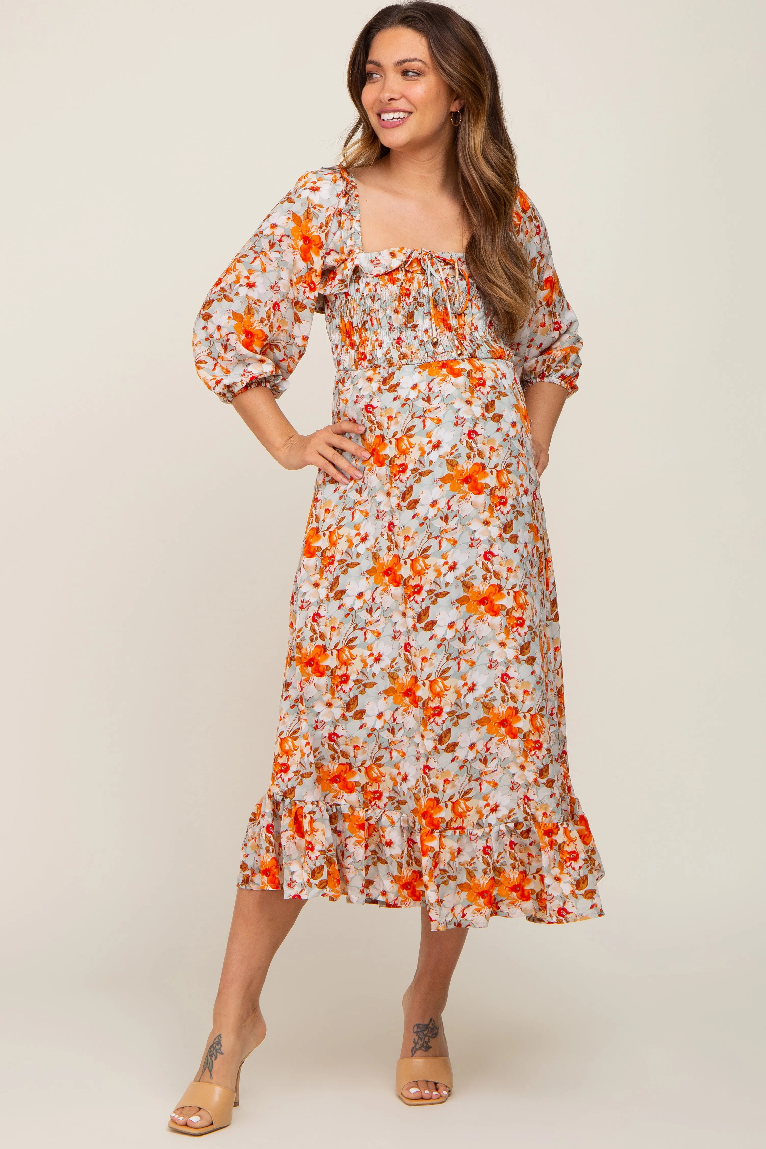 Light Blue Floral Ruffle Square Neck Smocked Front Tie Maternity Midi Dress sold by Pinkblush