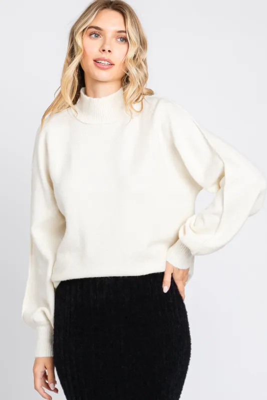 Ivory Mock Neck Sweater sold by Pinkblush