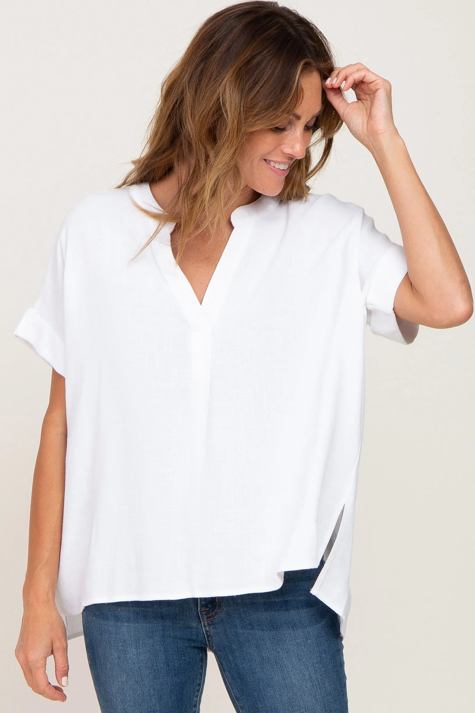 White Split Hem Cuffed Top sold by Pinkblush