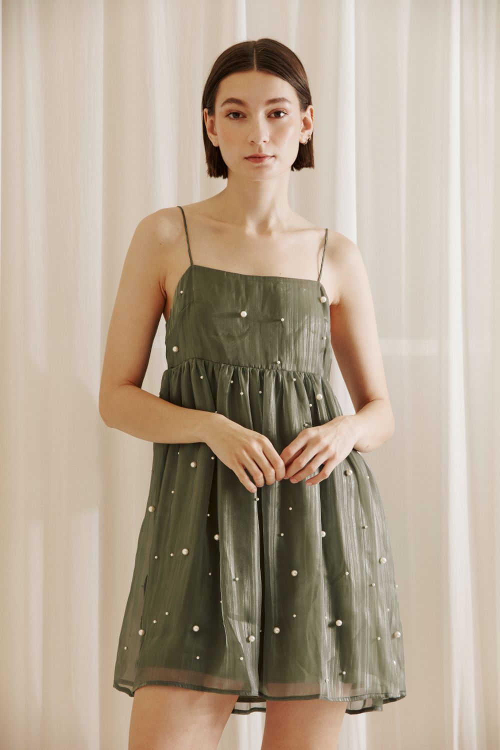 Olive Little Pearls Baby Doll Mini Dress sold by Pinkblush