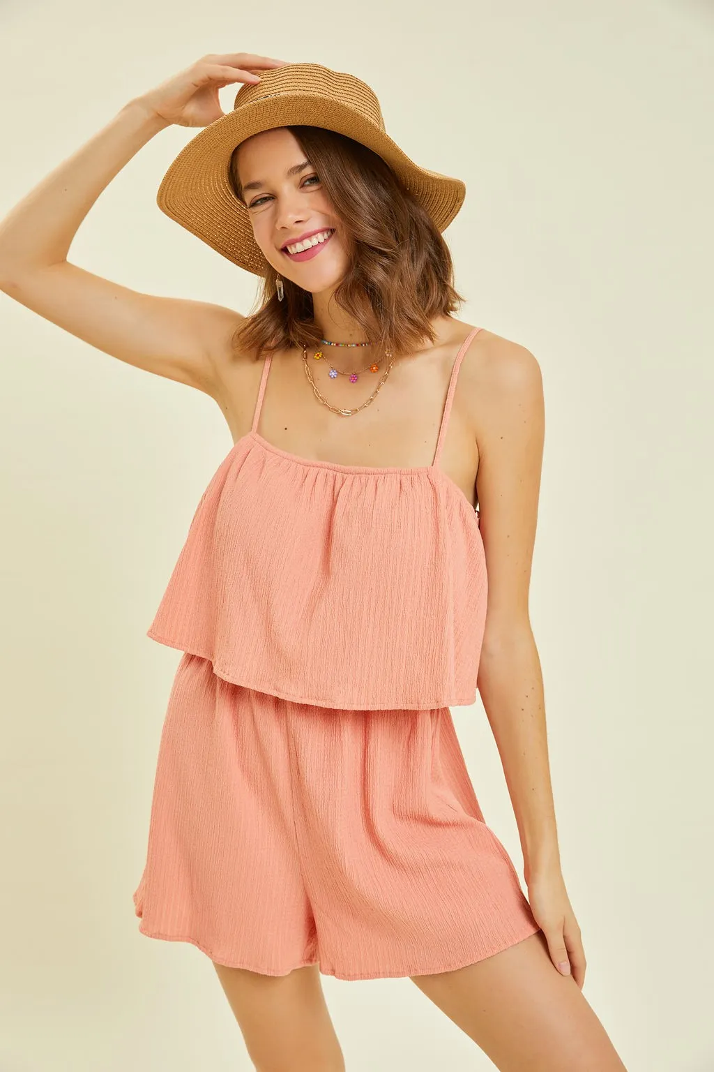 Coral Crinkled Ruffled Cami Romper sold by Pinkblush