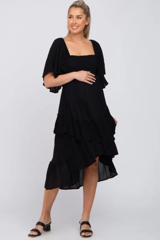 Black Smocked Asymmetric Tiered Maternity Midi Dress sold by Pinkblush