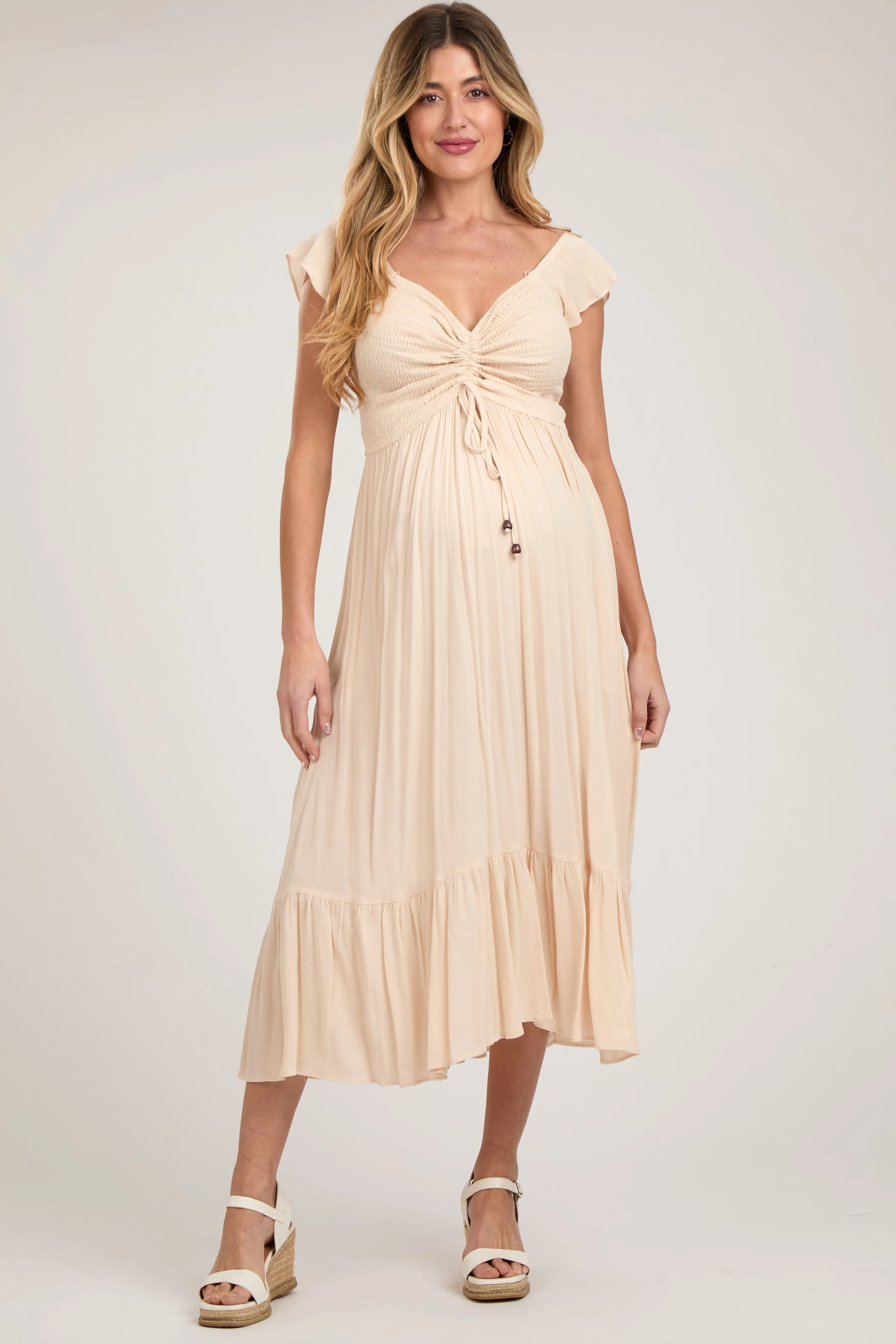 Beige Smocked Ruched Ruffle Hem Maternity Maxi Dress sold by Pinkblush